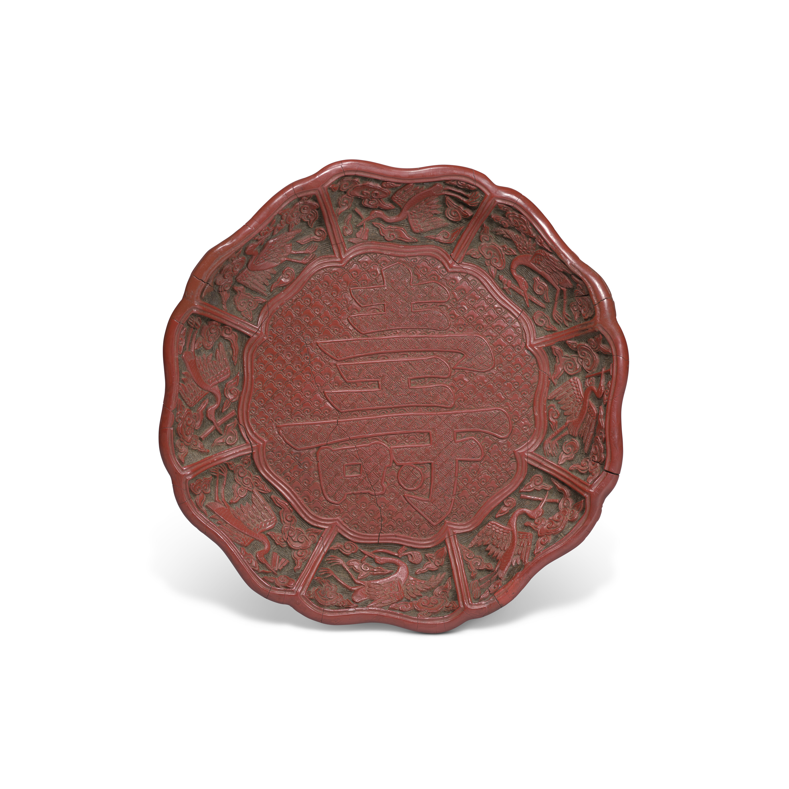 A CARVED CINNABAR LACQUER 'SHOU' DISH, JIAJING INCISED AND GILT