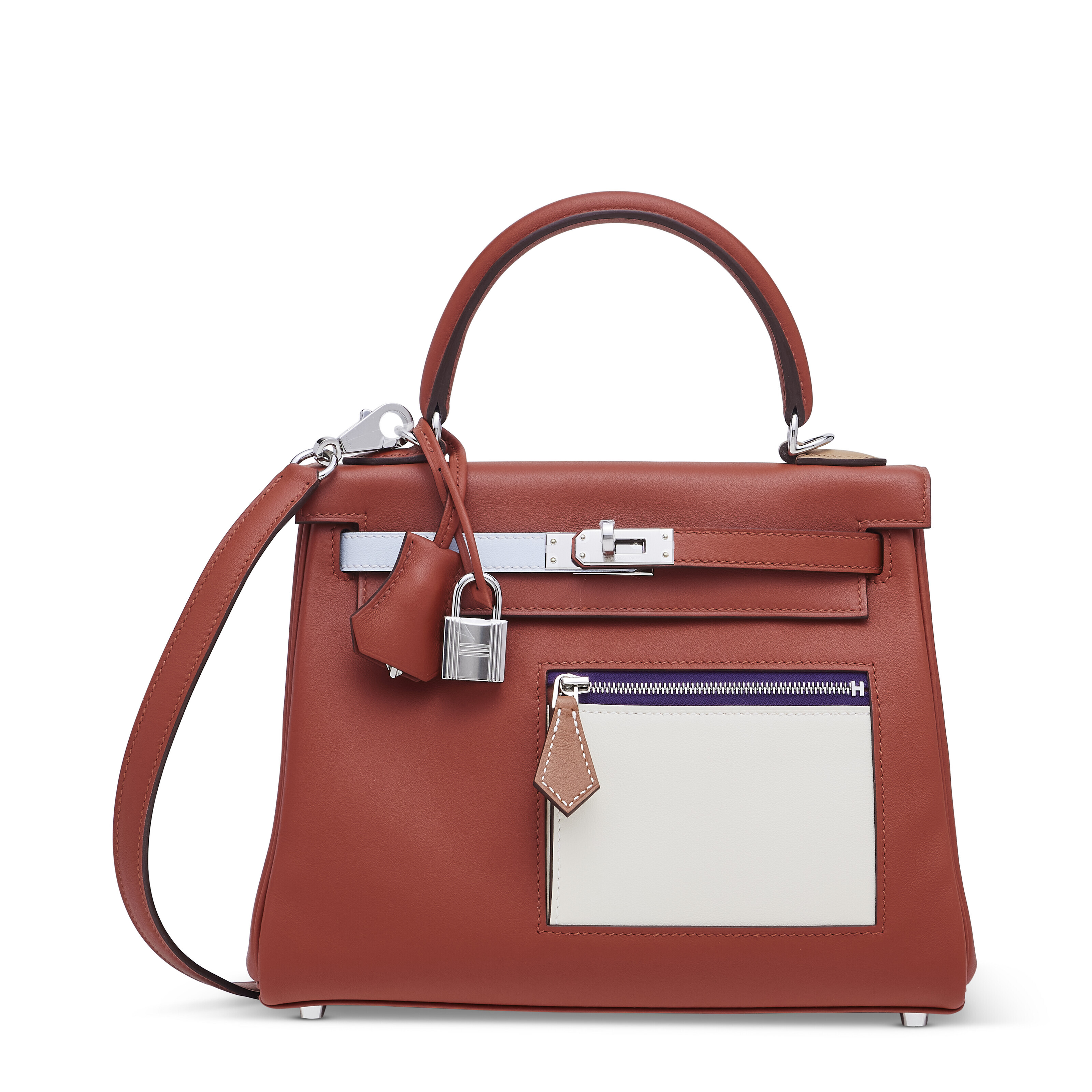 A limited edition cuivre, nata, bleu brume, chai and lime swift leather Colormatic Retourne Kelly 25 with palladium hardware, Hermes, 2023, sold for HK$239,400 on 25 May 2024 at Christie's in Hong Kong