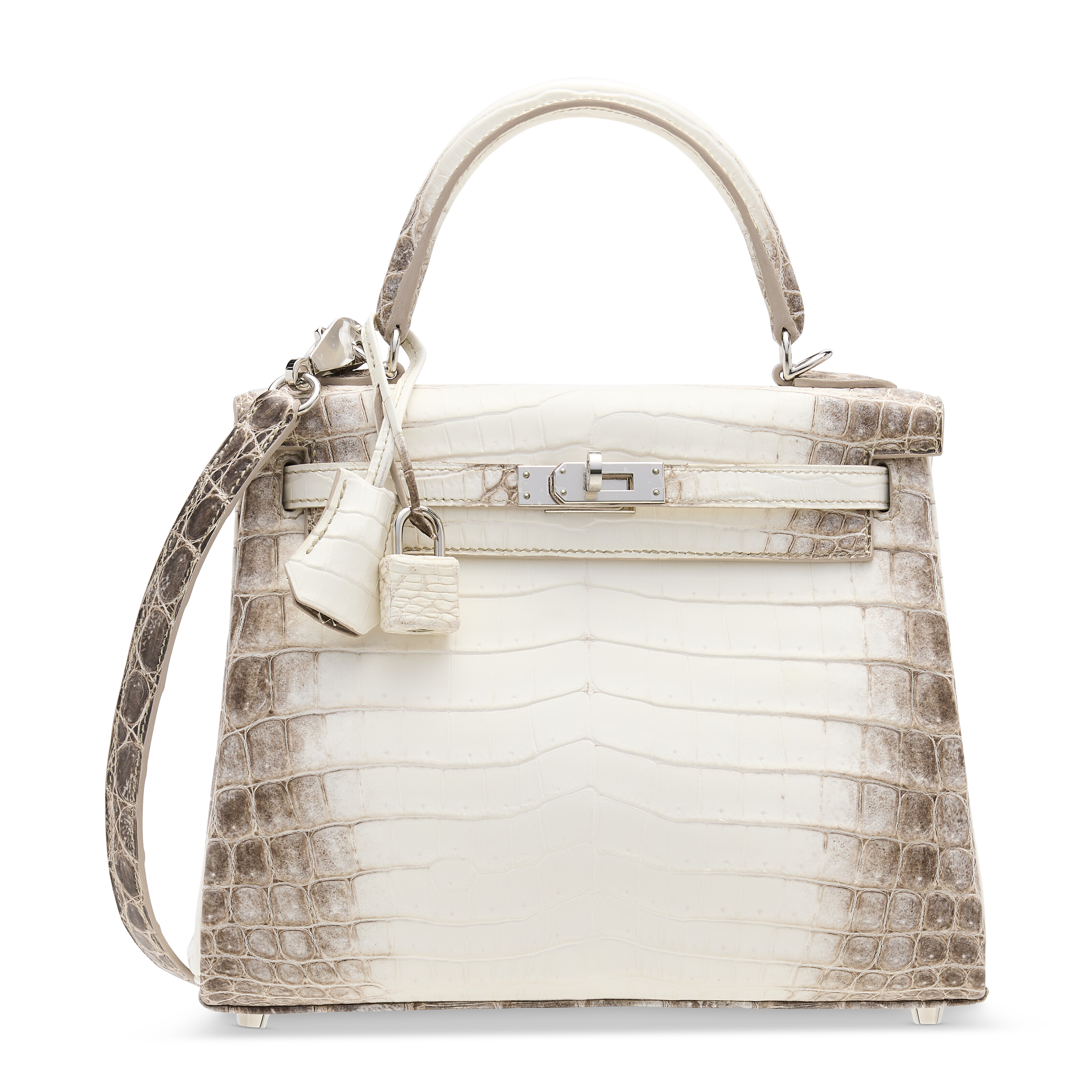 A rare, matte white himalaya niloticus crocodile retourné Kelly 25 with palladium hardware, Hermès, 2021. 25 w x 19 h x 9 d cm. Estimate: HK$ 700,000 –1,100,000. Offered in the Handbags & Accessories on 28 October 2024 at Christie’s in Hong Kong