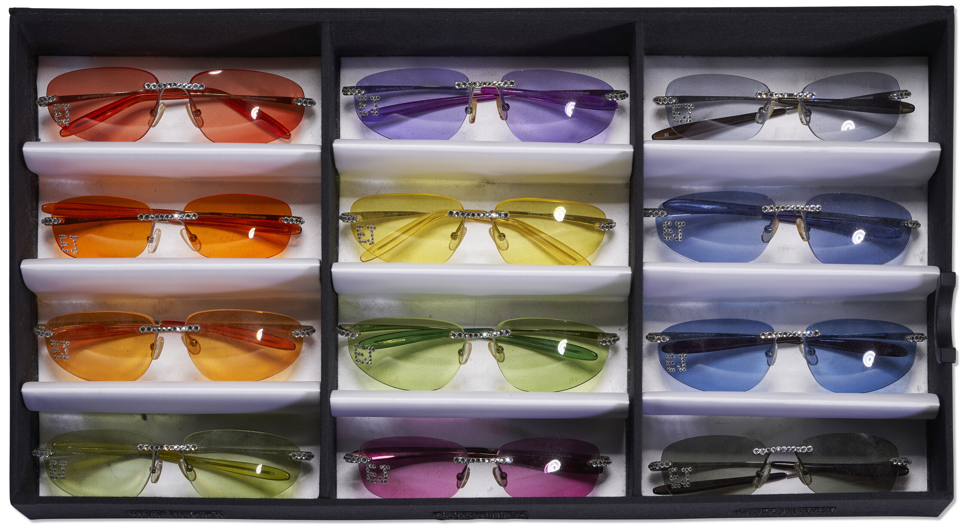 A GROUP OF TWELVE VARIOUSLY COLORED SUNGLASSES JIMMY CRYSTAL CIRCA 2010 Christie s