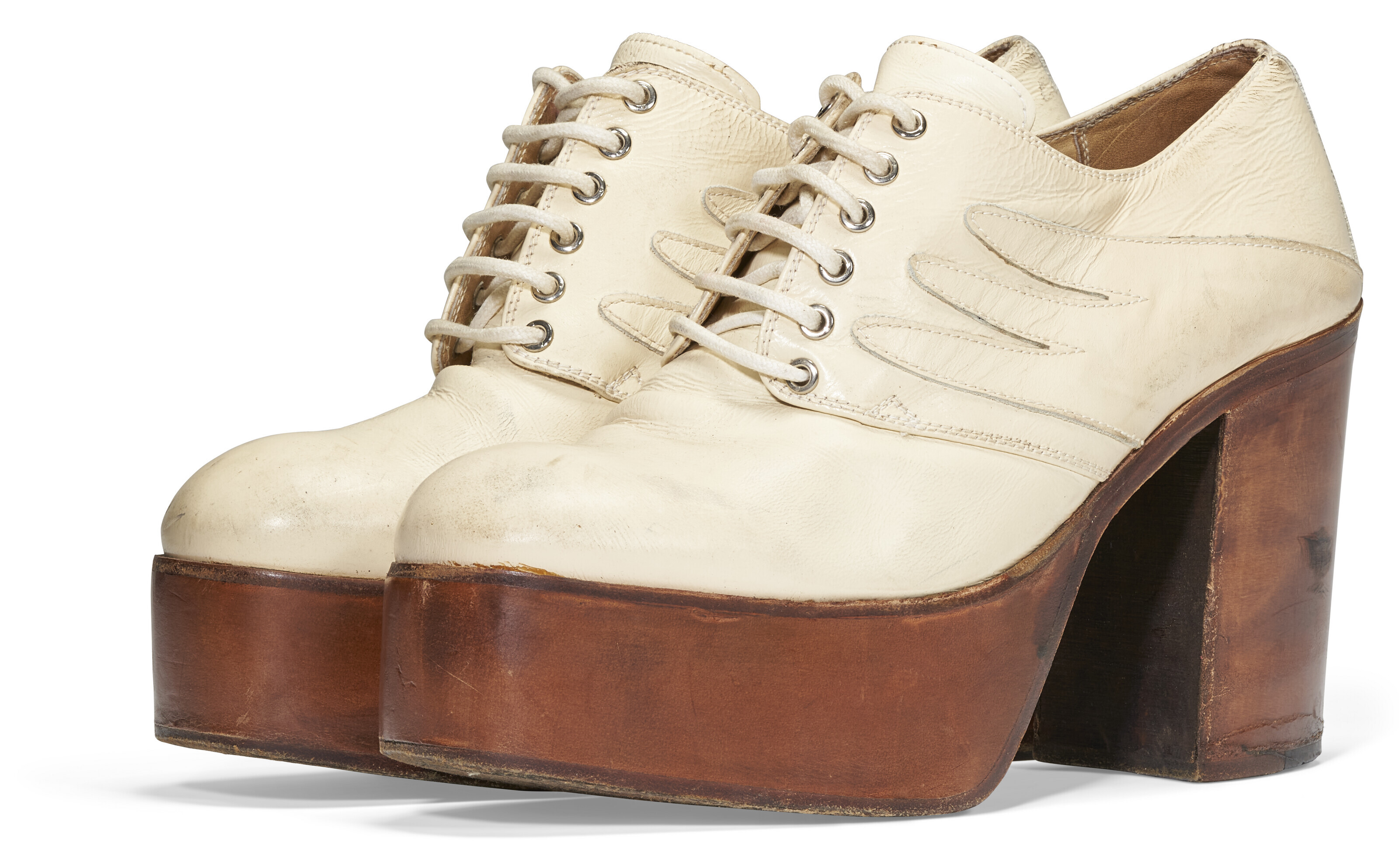 A PAIR OF CREAM AND BROWN LEATHER PLATFORM SHOES, NUNN BUSH, SECOND HALF  20TH CENTURY | Christie's