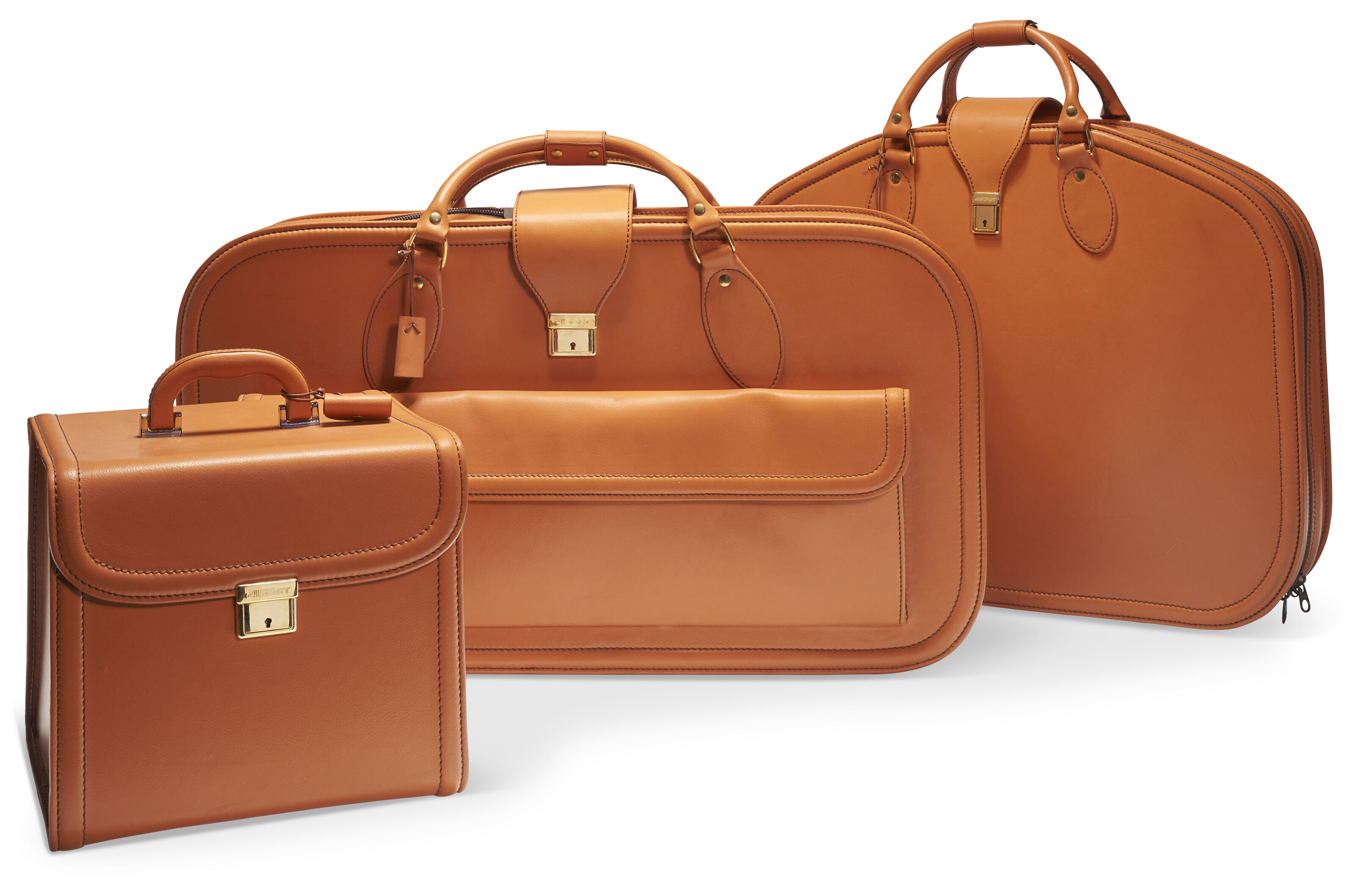 A SET OF THREE FITTED TAN LEATHER LUGGAGE FOR A FERRARI 456 GT 