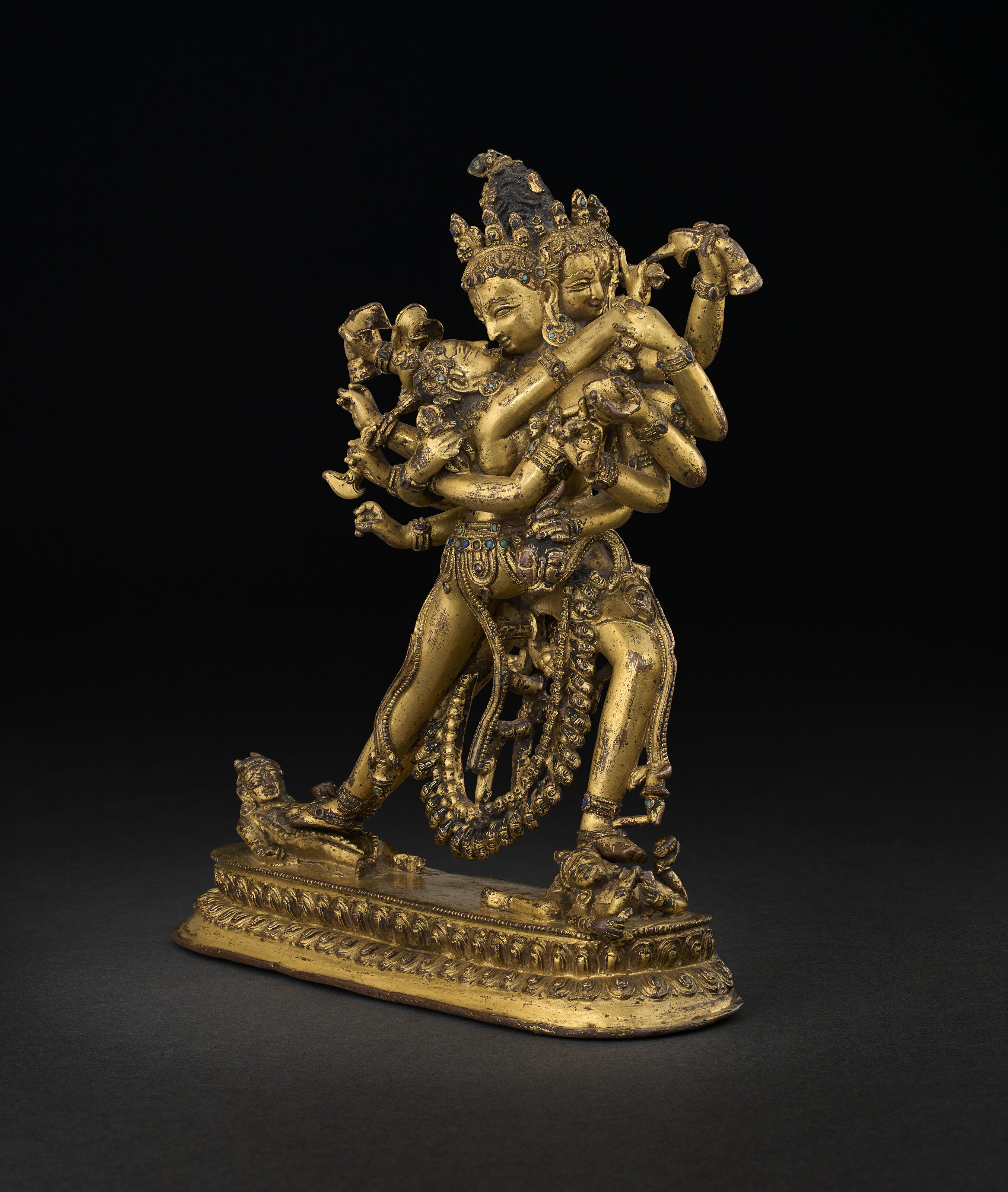 A GILT-BRONZE FIGURE OF CHAKRASAMVARA, NEPAL, 15TH CENTURY
