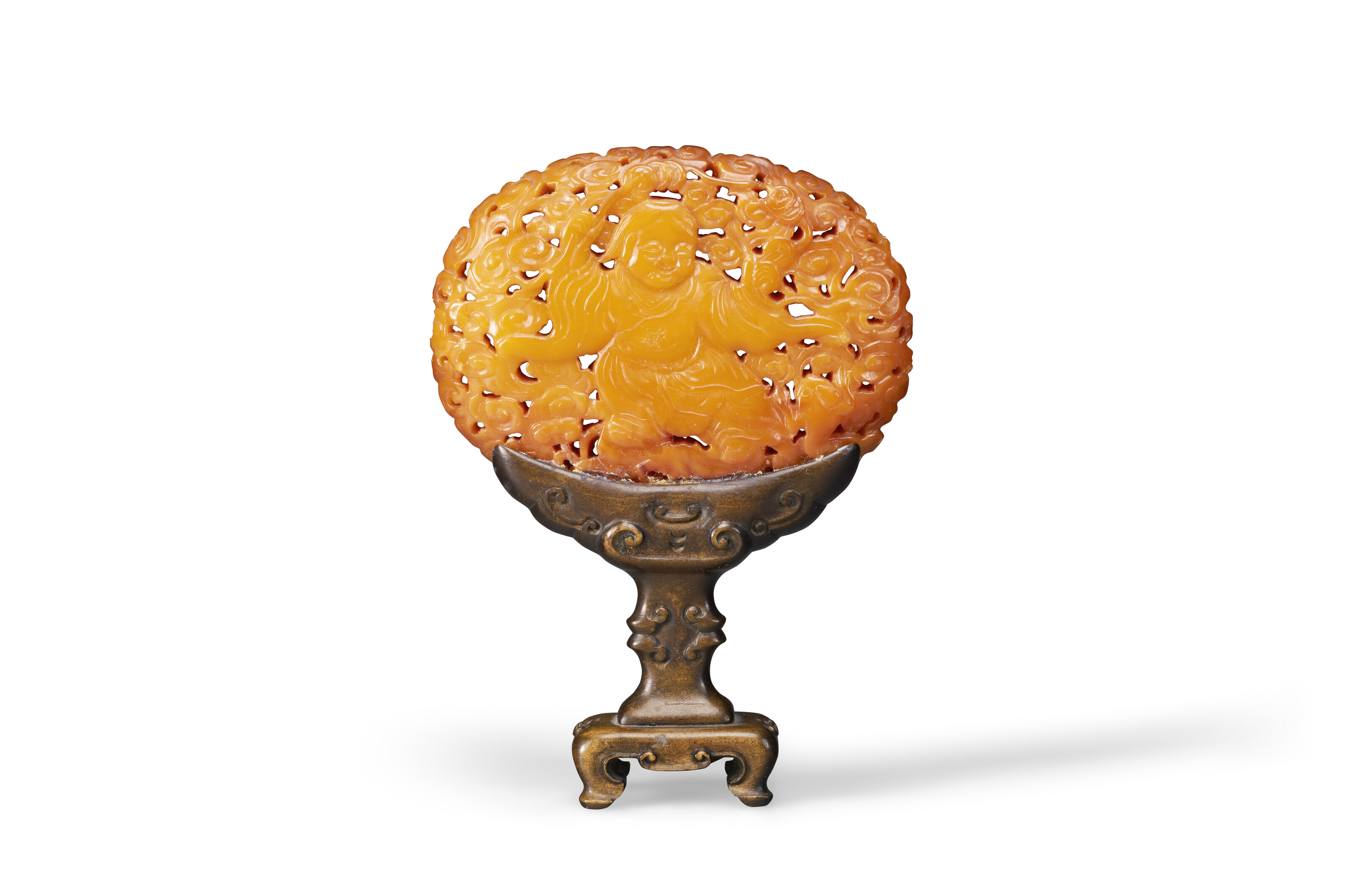 A WELL-CARVED AMBER LIU HAI AND TOAD PLAQUE, 18TH CENTURY | Christies