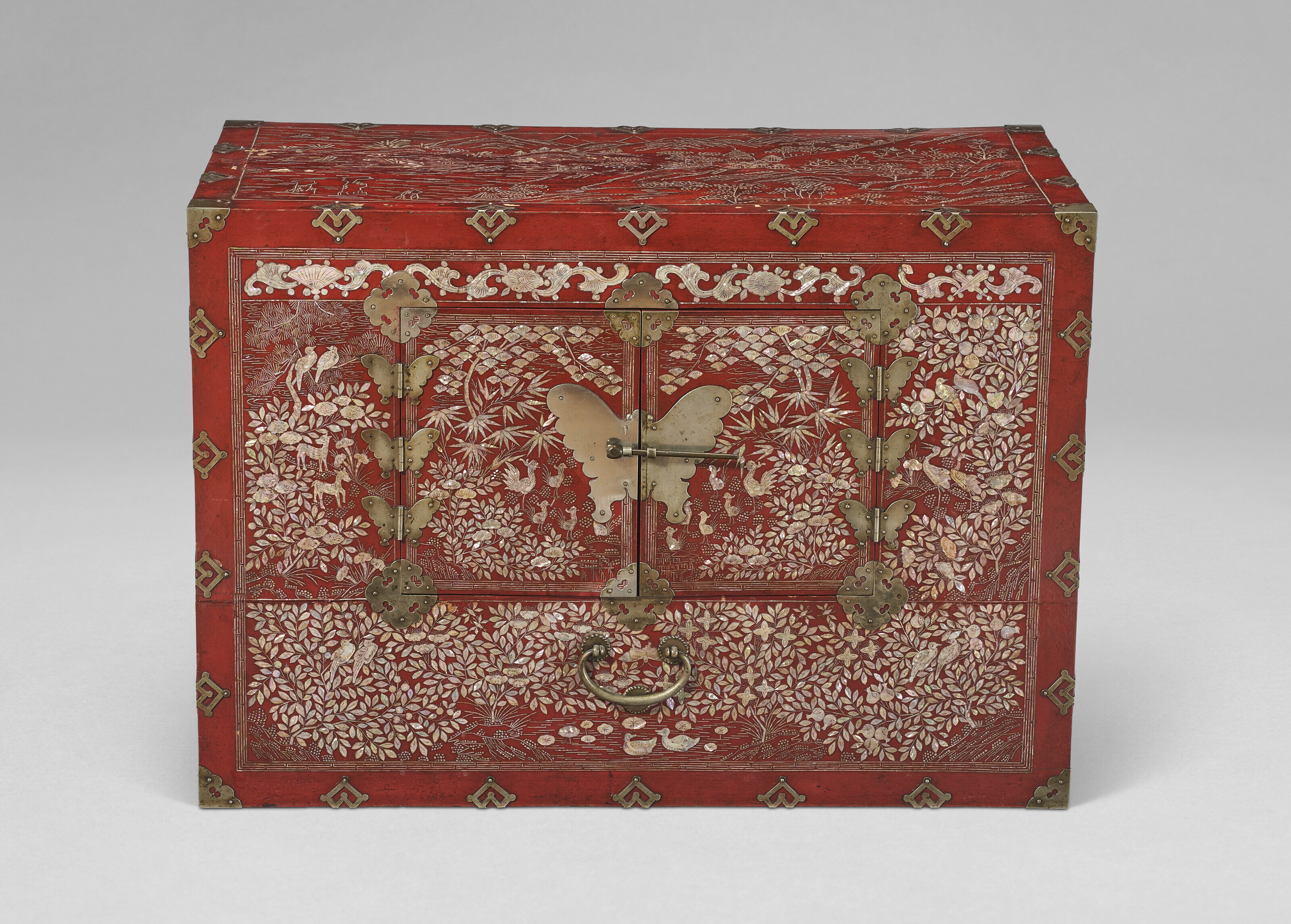 A MOTHER-OF-PEARL INLAID RED LACQUER STORAGE CHEST, KOREA, JOSEON DYNASTY  (19TH-20TH CENTURY) | Christie's