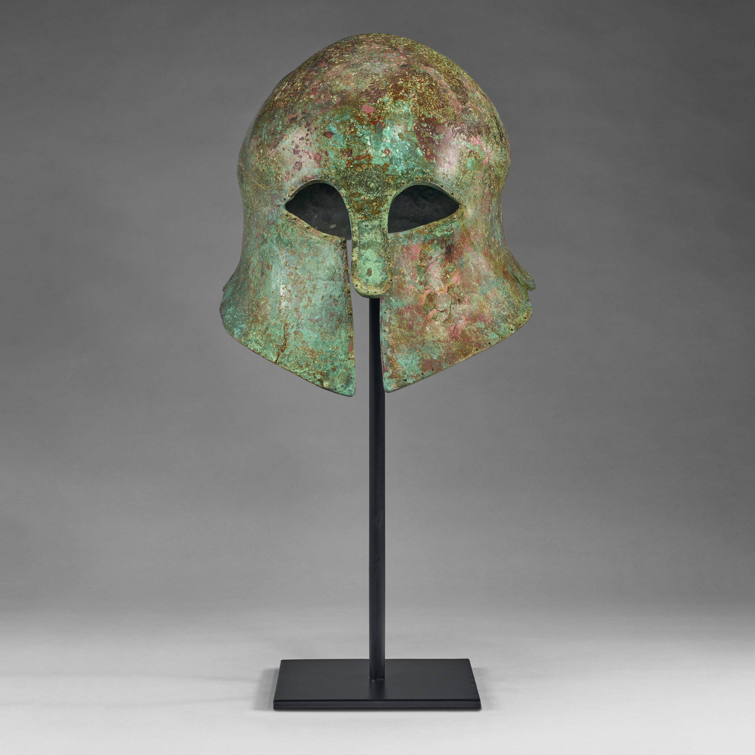 AN ITALIC BRONZE MONTEFORTINO HELMET, CIRCA 300-200 B.C. | Christie's