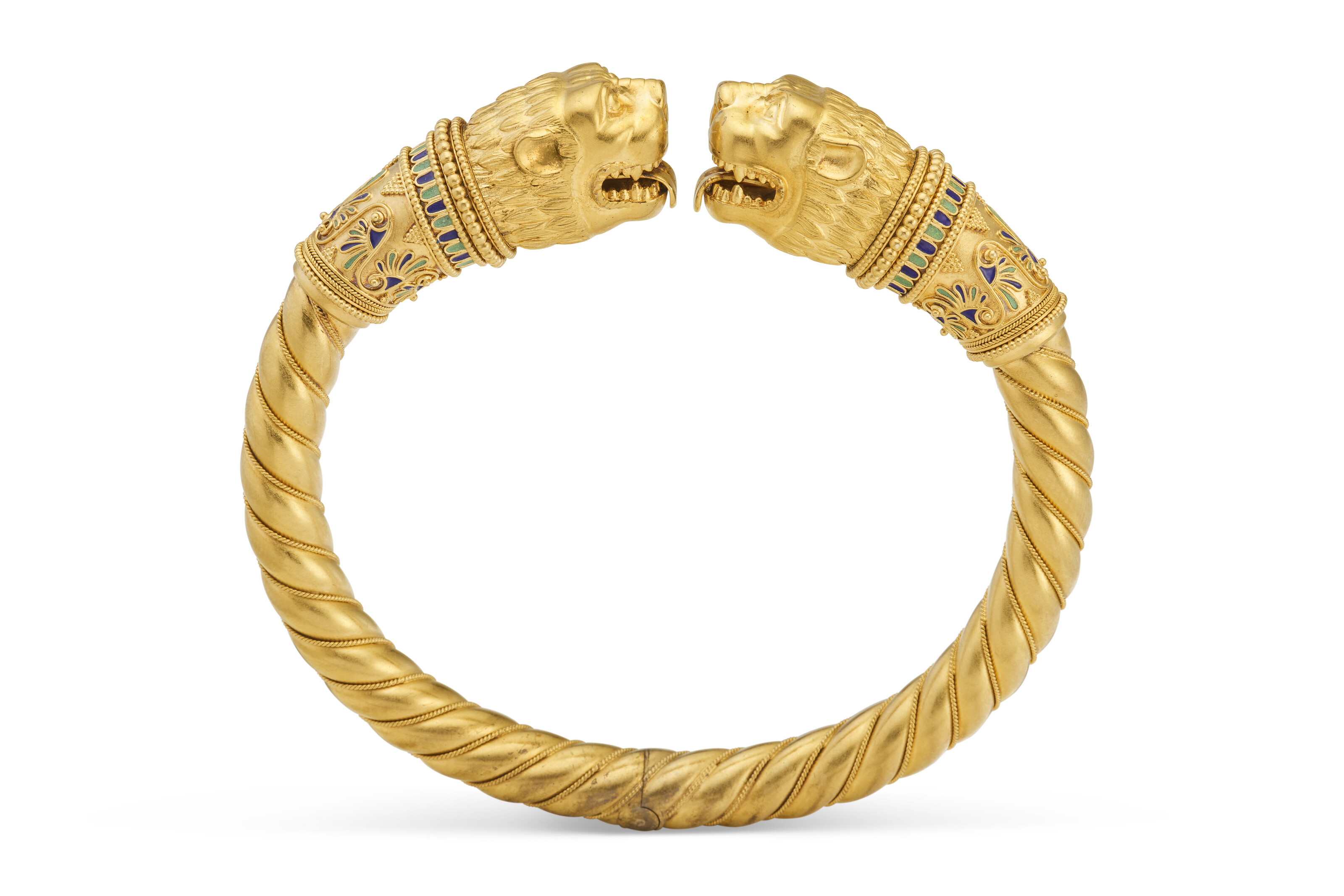 A RARE ENAMEL AND GOLD BANGLE IN THE SCYTHIAN STYLE, BY FABERGÉ