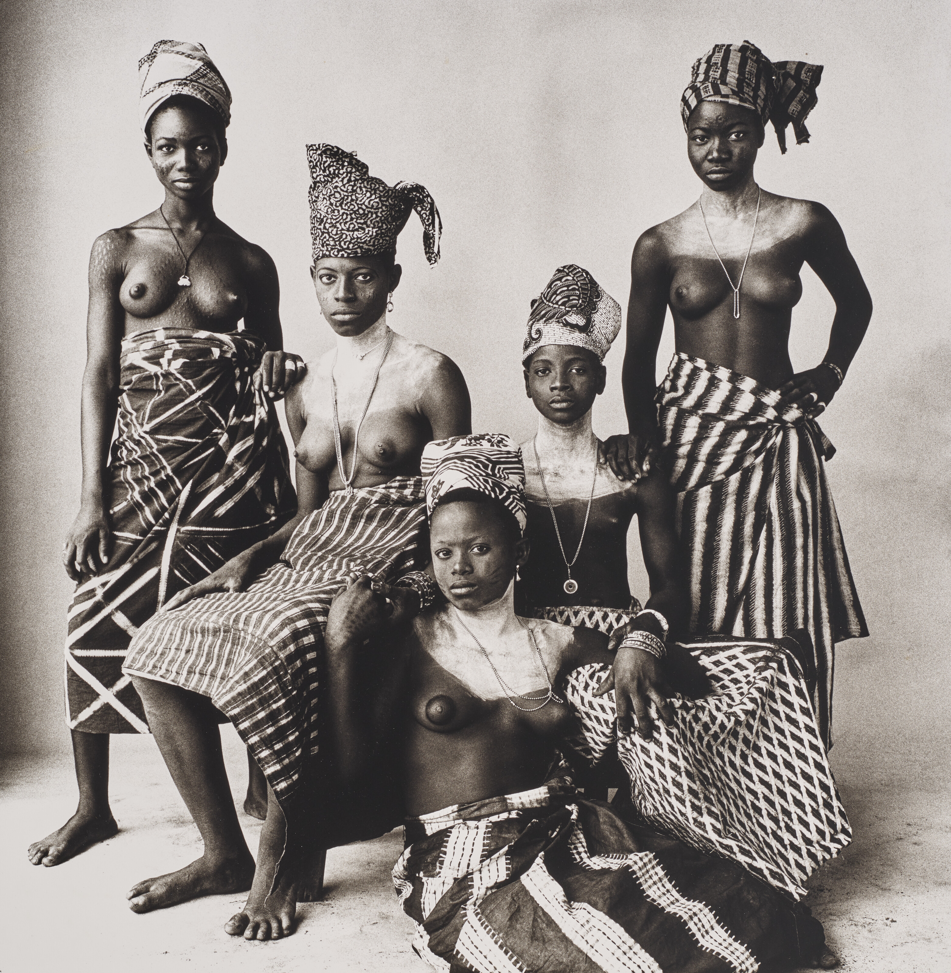 IRVING PENN (1917–2009), Five Dahomey Girls, Two Standing, 1967 