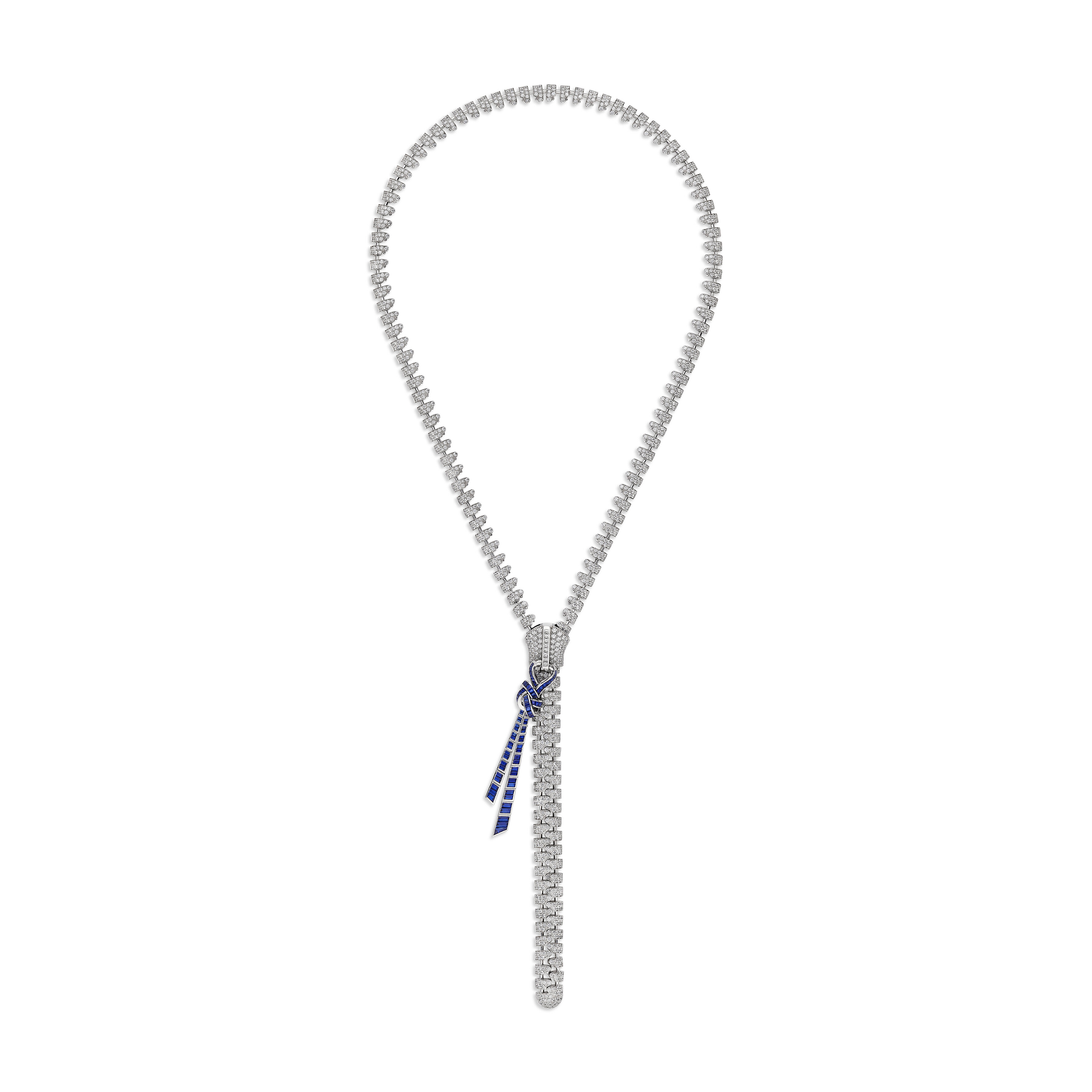 AN ICONIC VAN CLEEF & ARPELS SAPPHIRE AND DIAMOND 'ZIP COUTURE