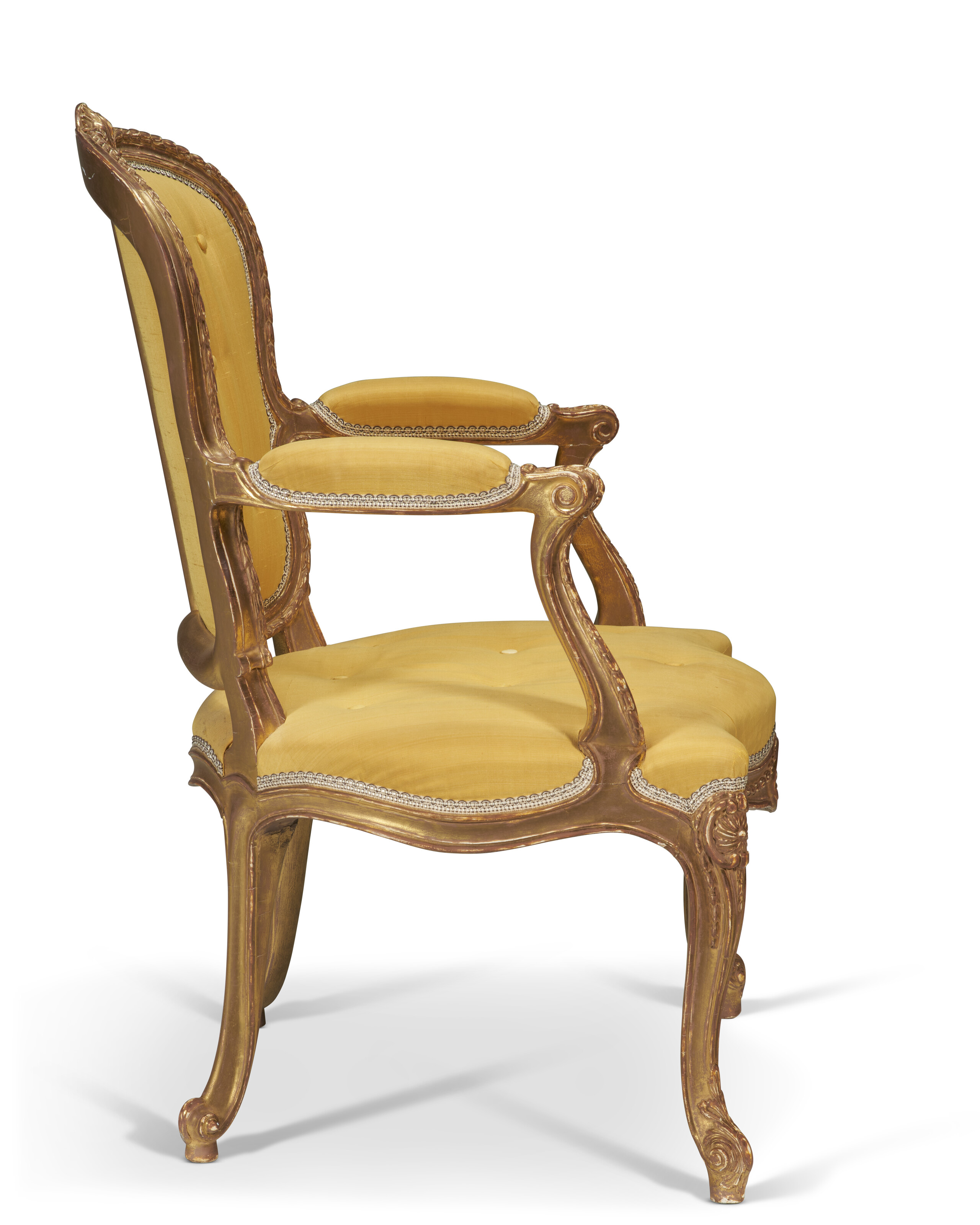A GEORGE III GILTWOOD ARMCHAIR, ATTRIBUTED TO THOMAS CHIPPENDALE