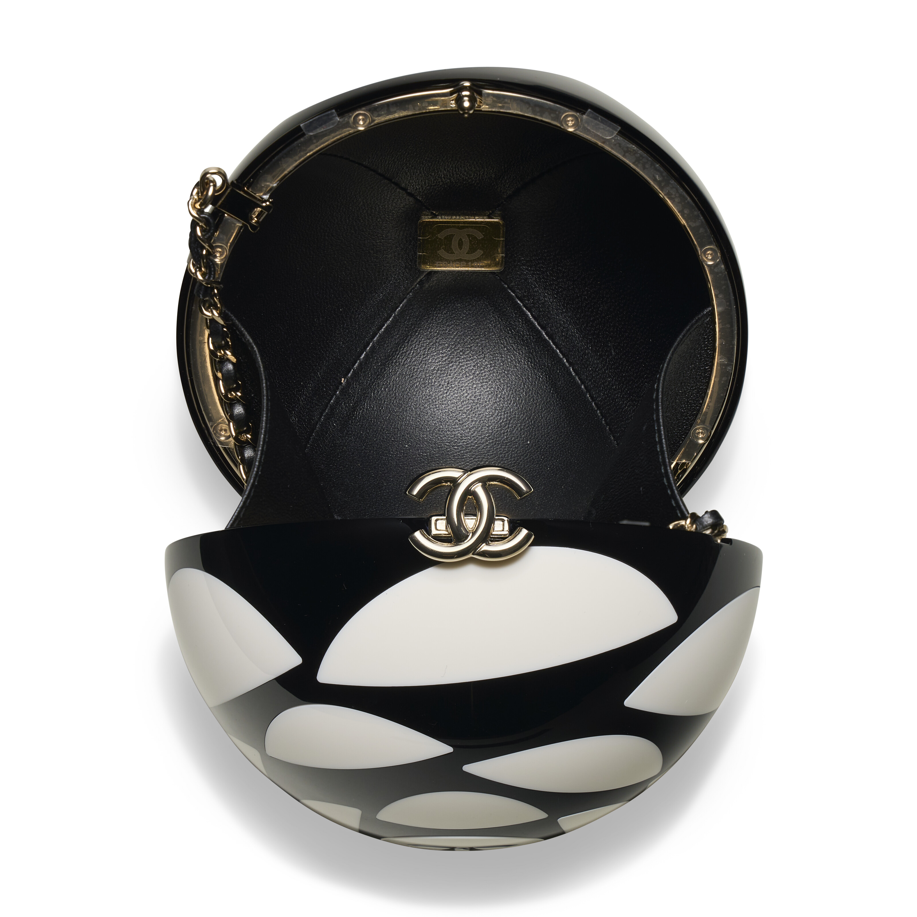 A RUNWAY, BLACK AND WHITE RESIN CAMELLIA SPHERE MINAUDIERE WITH