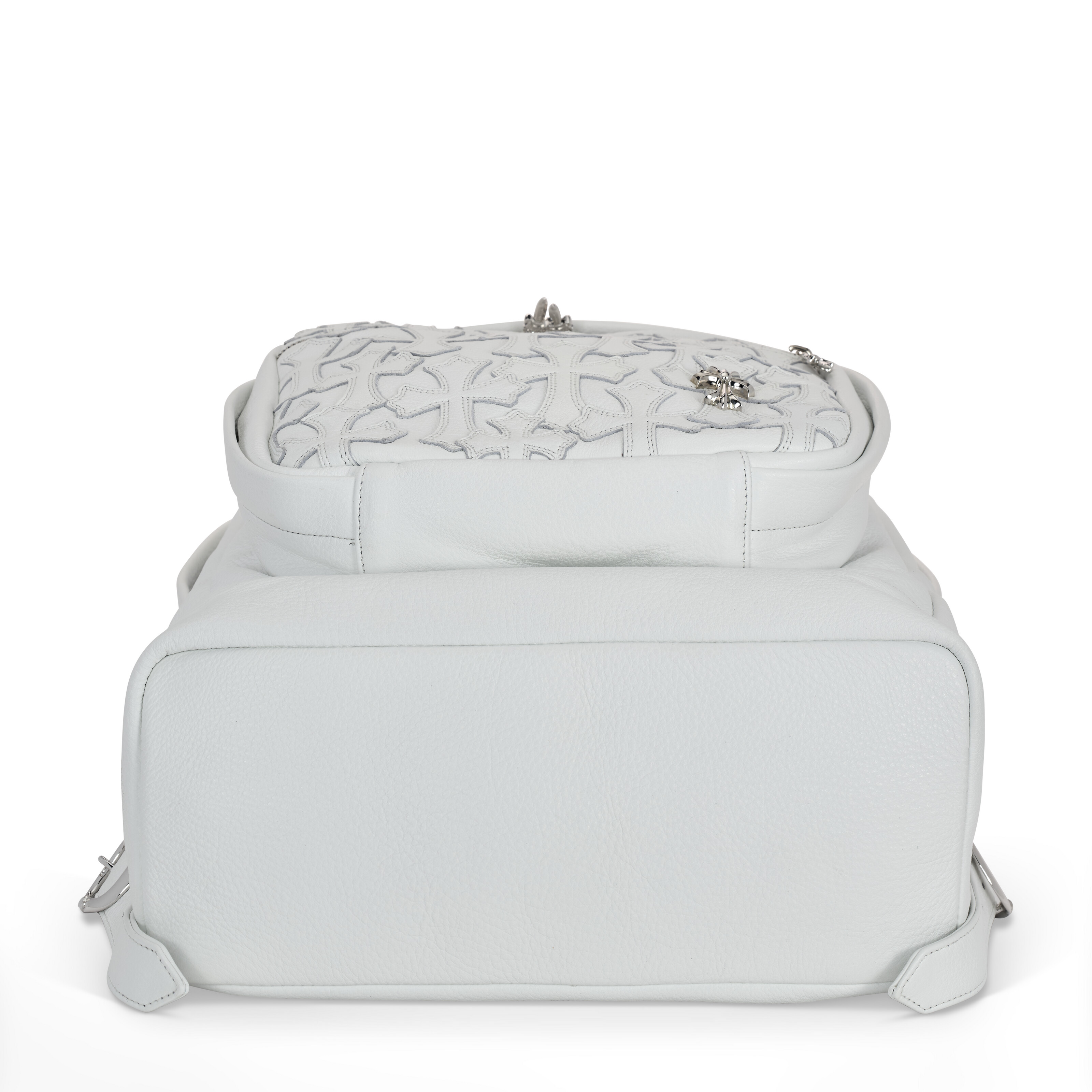 A WHITE PEBBLED LEATHER CROSS PATCH BACKPACK WITH STERLING 