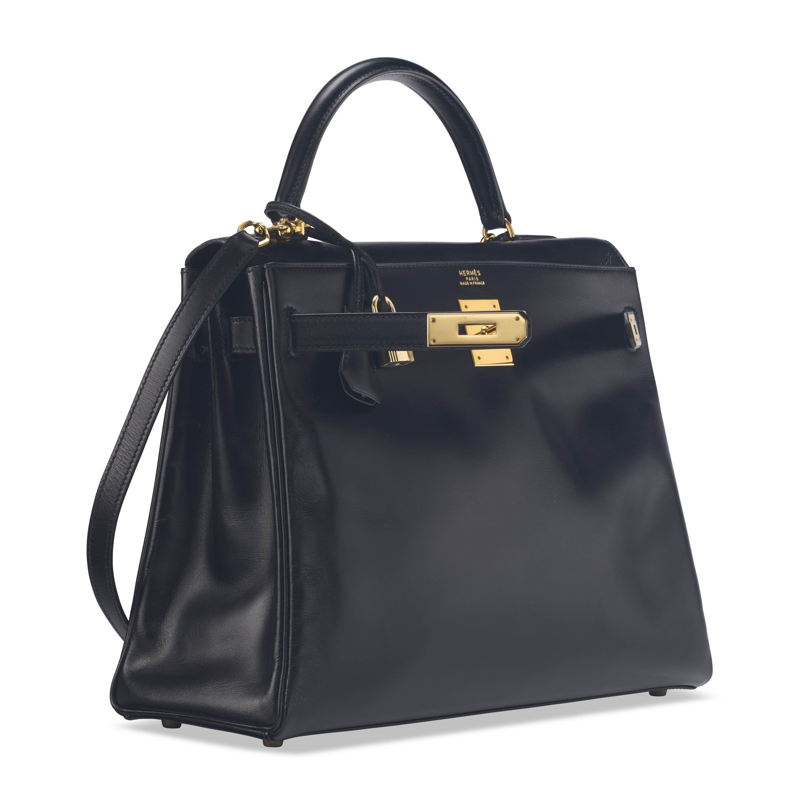 A BLACK CALF BOX LEATHER RETOURNÉ KELLY 32 WITH GOLD HARDWARE
