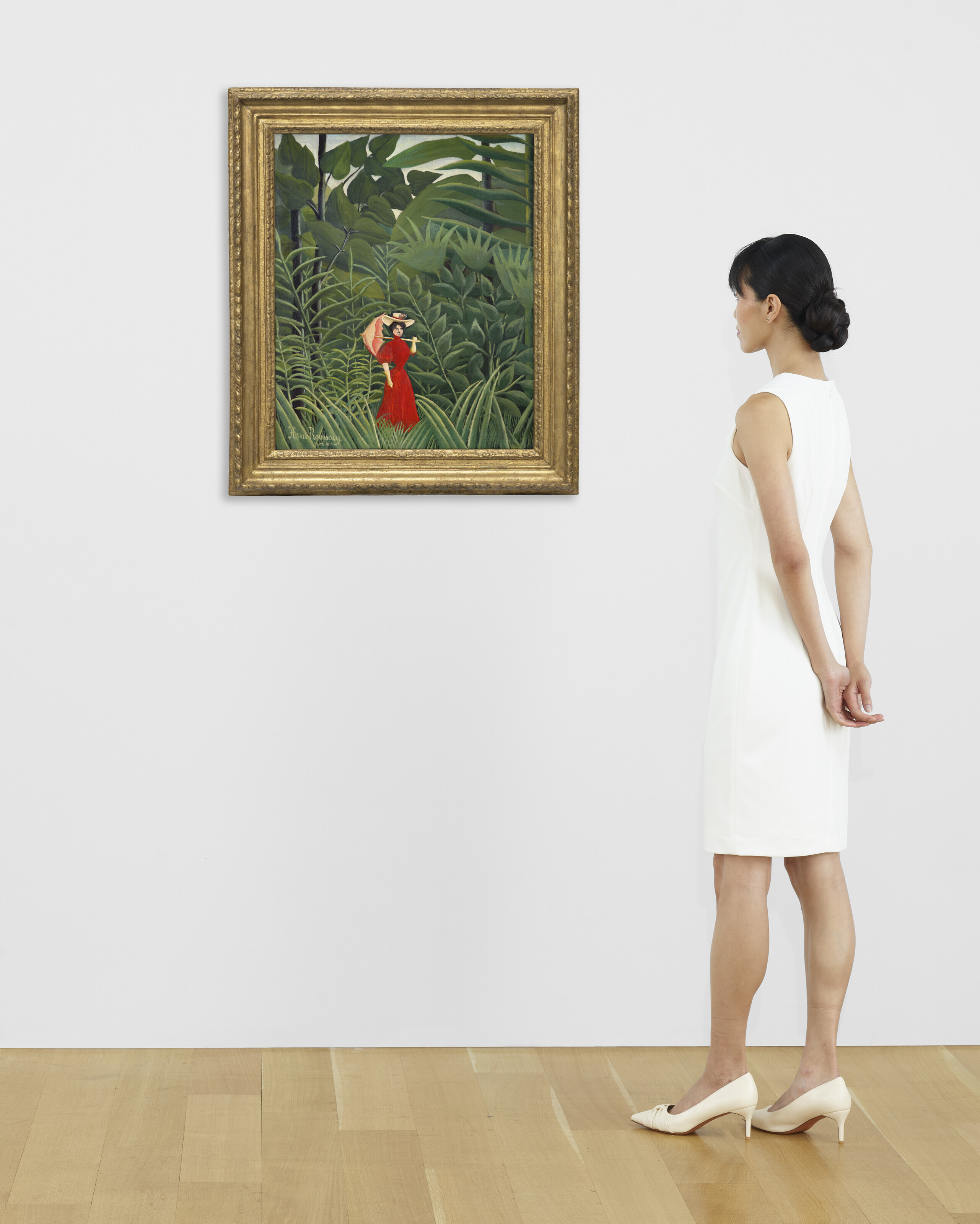 HENRI 'LE DOUANIER' ROUSSEAU (1844-1910), Femme en rouge dans la