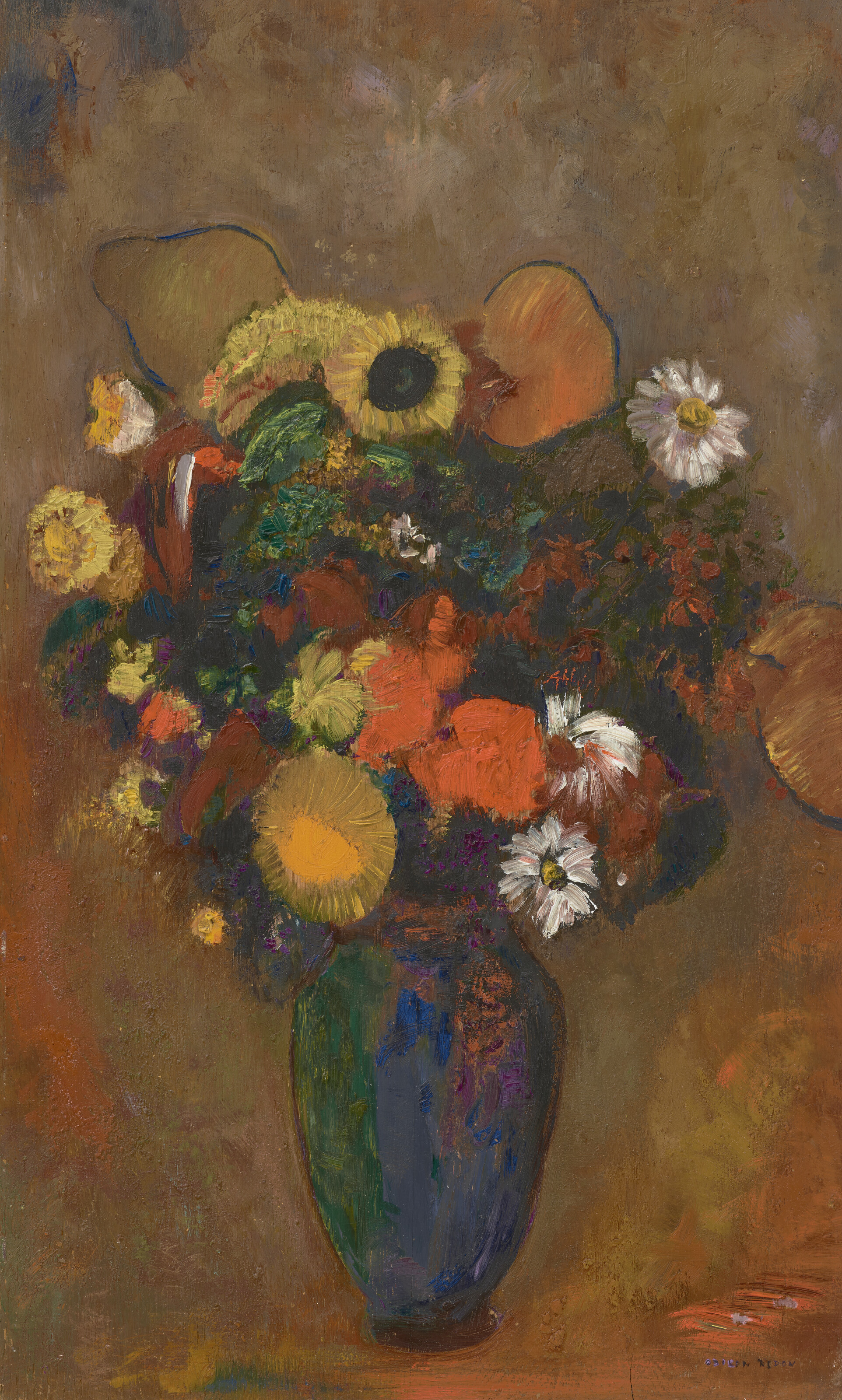 Fleurs dans un vase vert