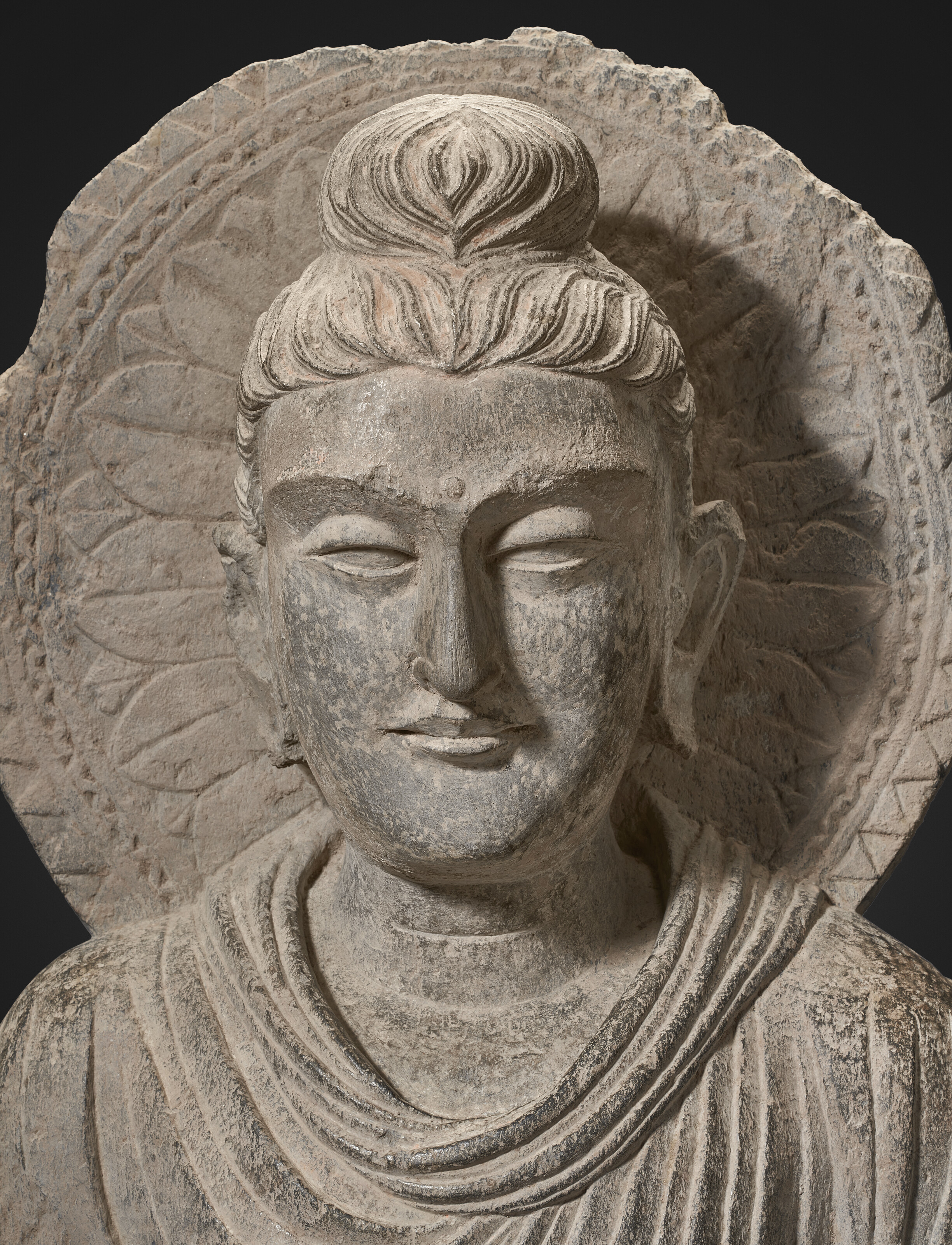 Stionsal Aghaidh Buddha A RARE AND MONUMENTAL INSCRIBED GREY SCHIST