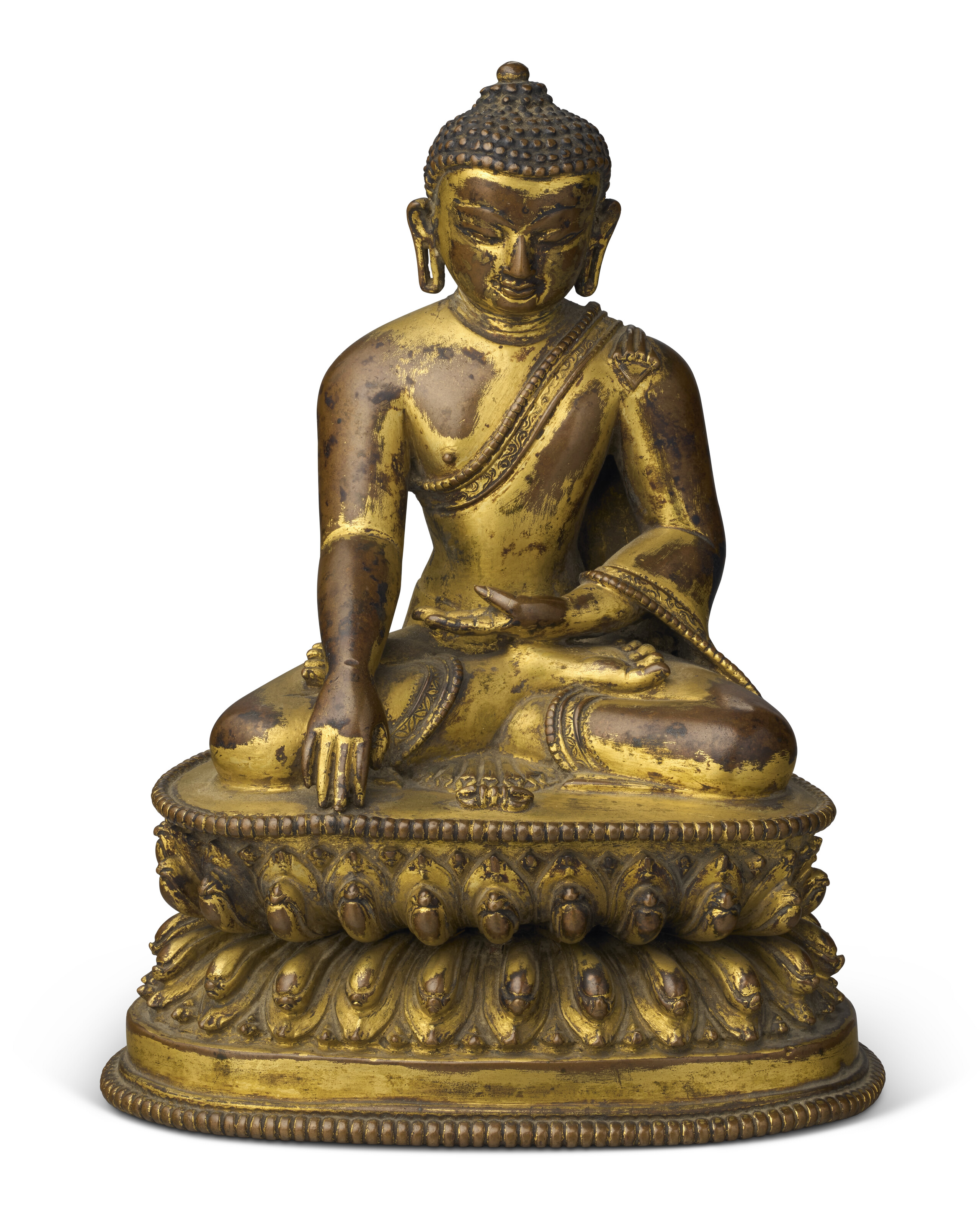 A GILT-BRONZE FIGURE OF BUDDHA, TIBET, 15TH-16TH CENTURY | Christie's