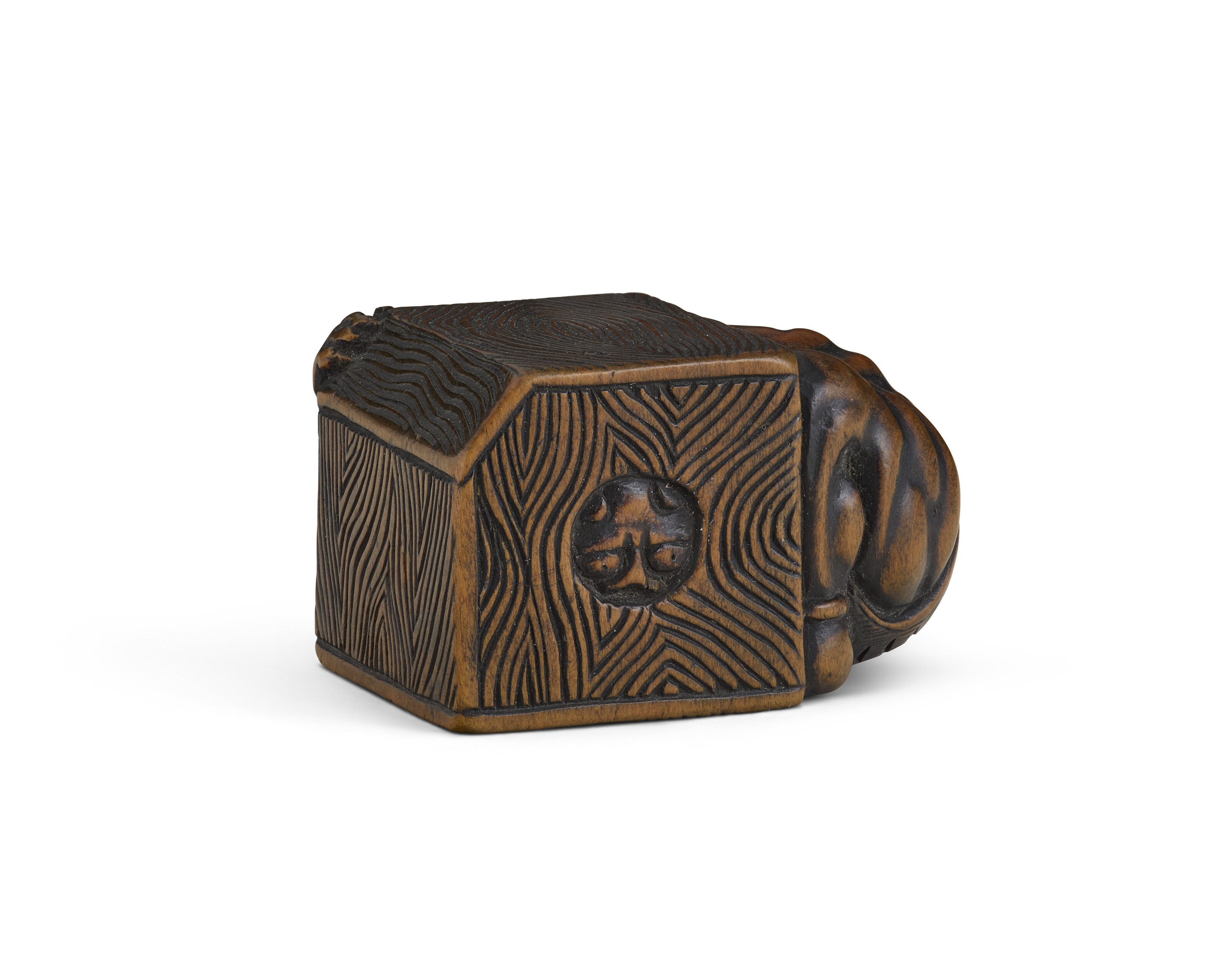 A CARVED WOOD NETSUKE OF A DEMON IN BOX, JAPAN, EDO PERIOD (19TH