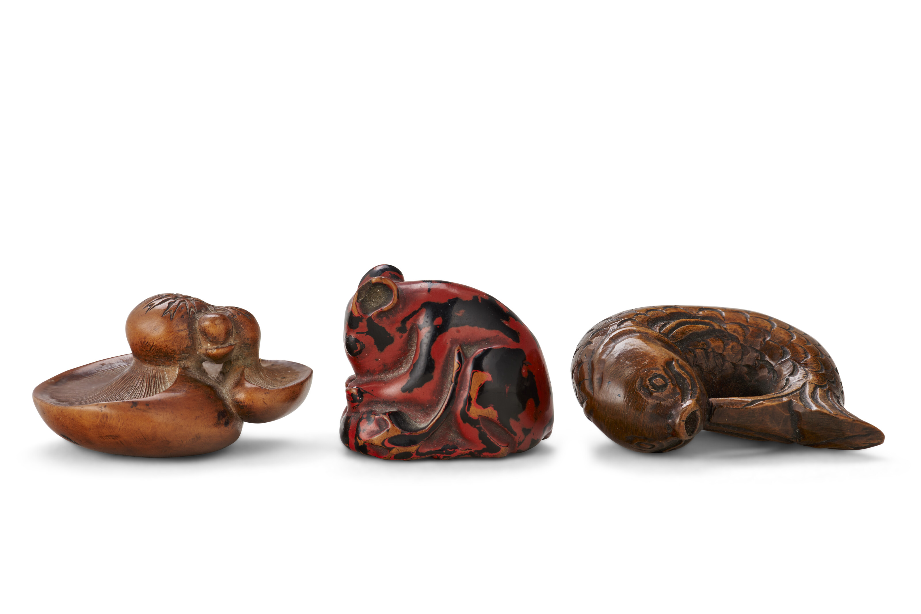 A GROUP OF SIX CARVED WOOD AND LACQUERED NETSUKE, JAPAN, 19TH-20TH