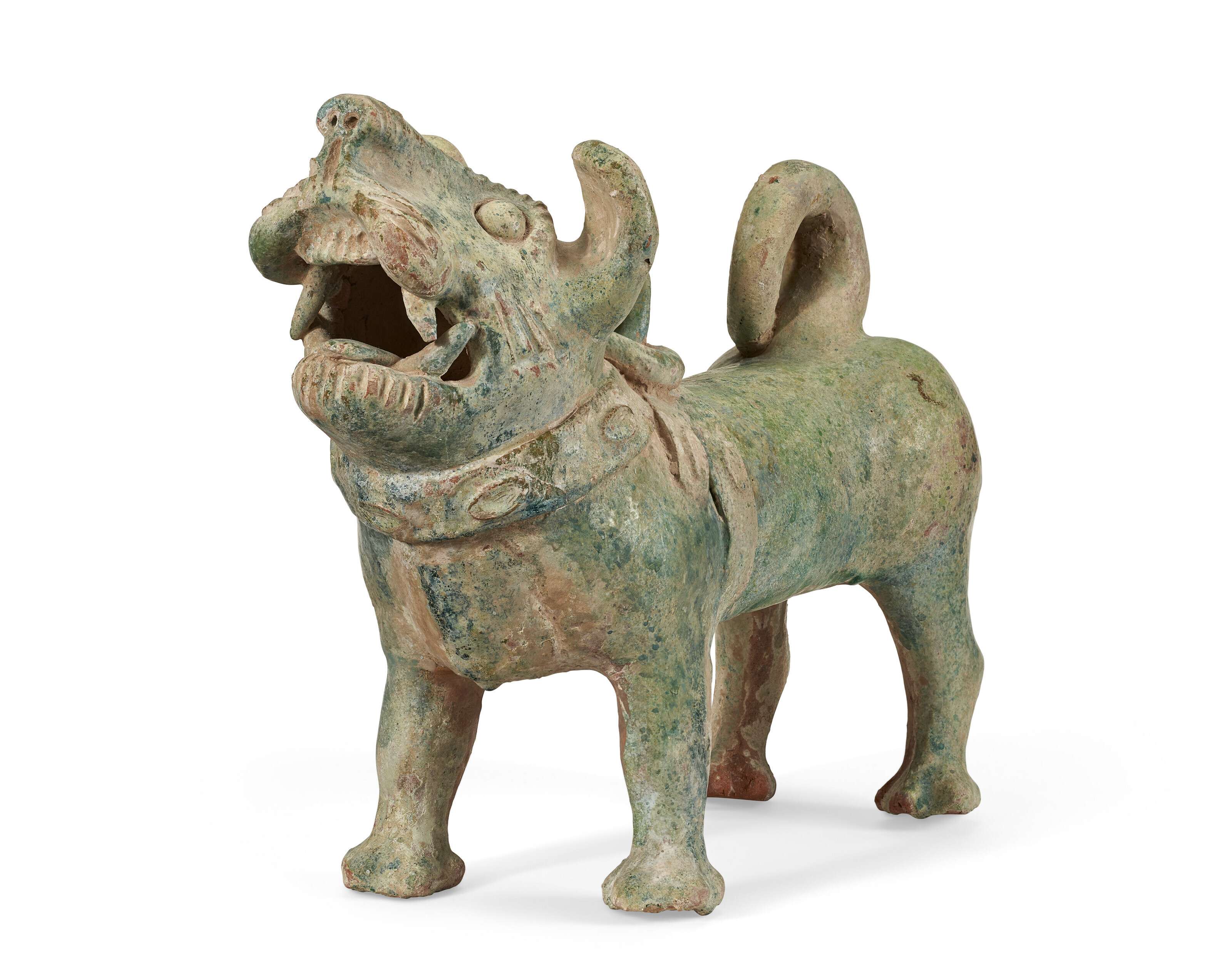 A GREEN-GLAZED POTTERY FIGURE OF A DOG, HAN DYNASTY (206 BC-AD 220
