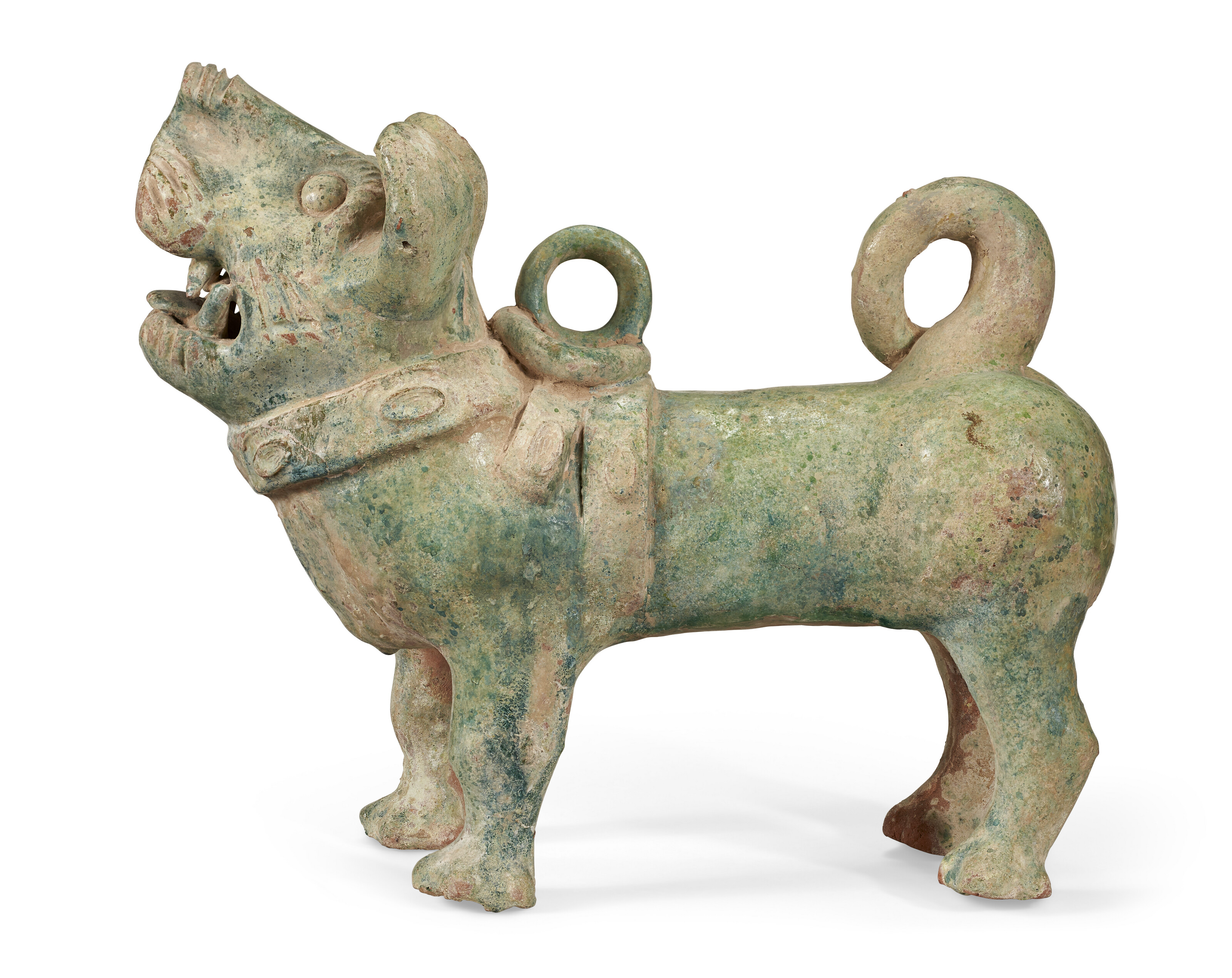 A GREEN-GLAZED POTTERY FIGURE OF A DOG, HAN DYNASTY (206 BC-AD 220