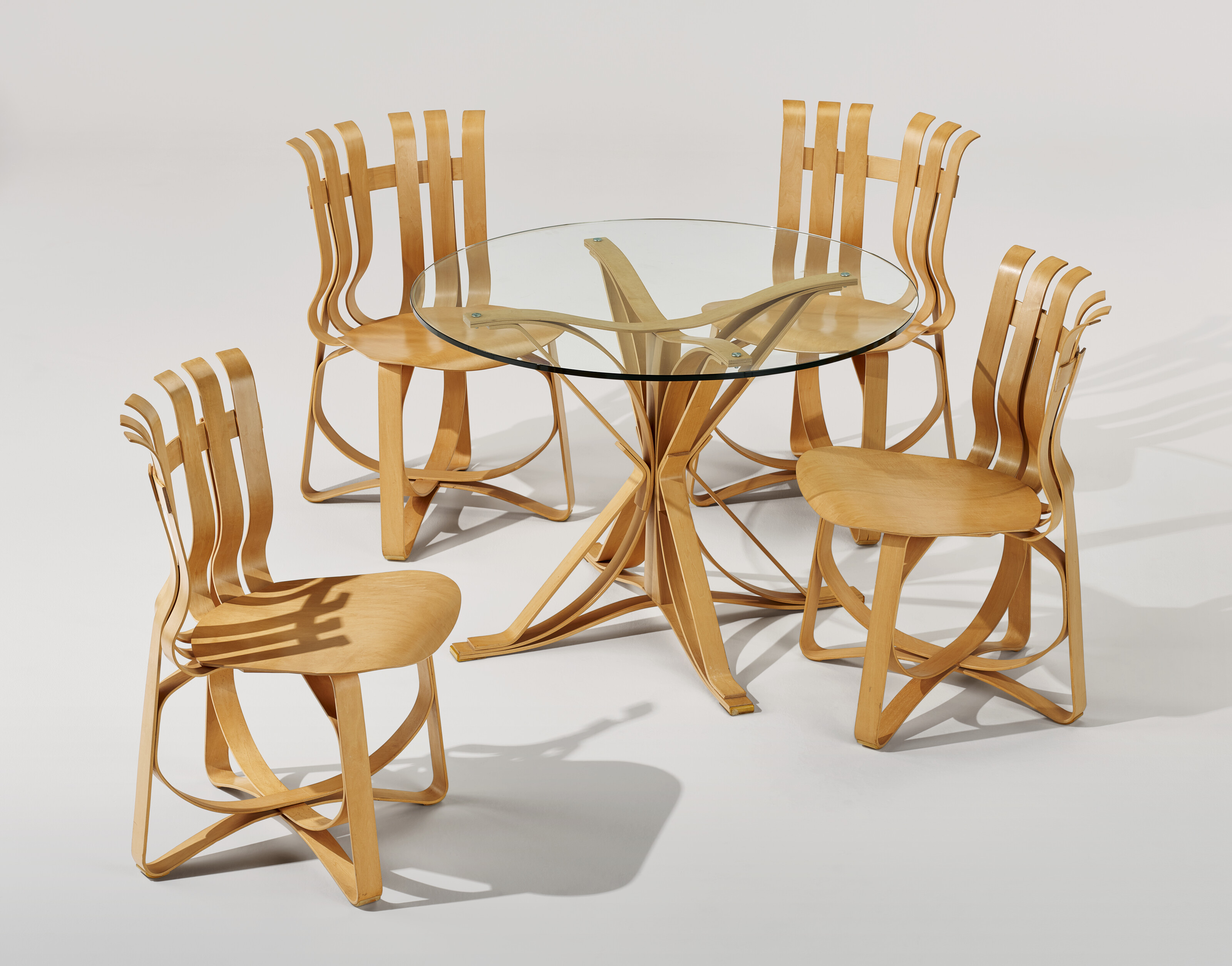 FRANK GEHRY (B. 1929), 'Hat Trick' Dining Set, designed 1991
