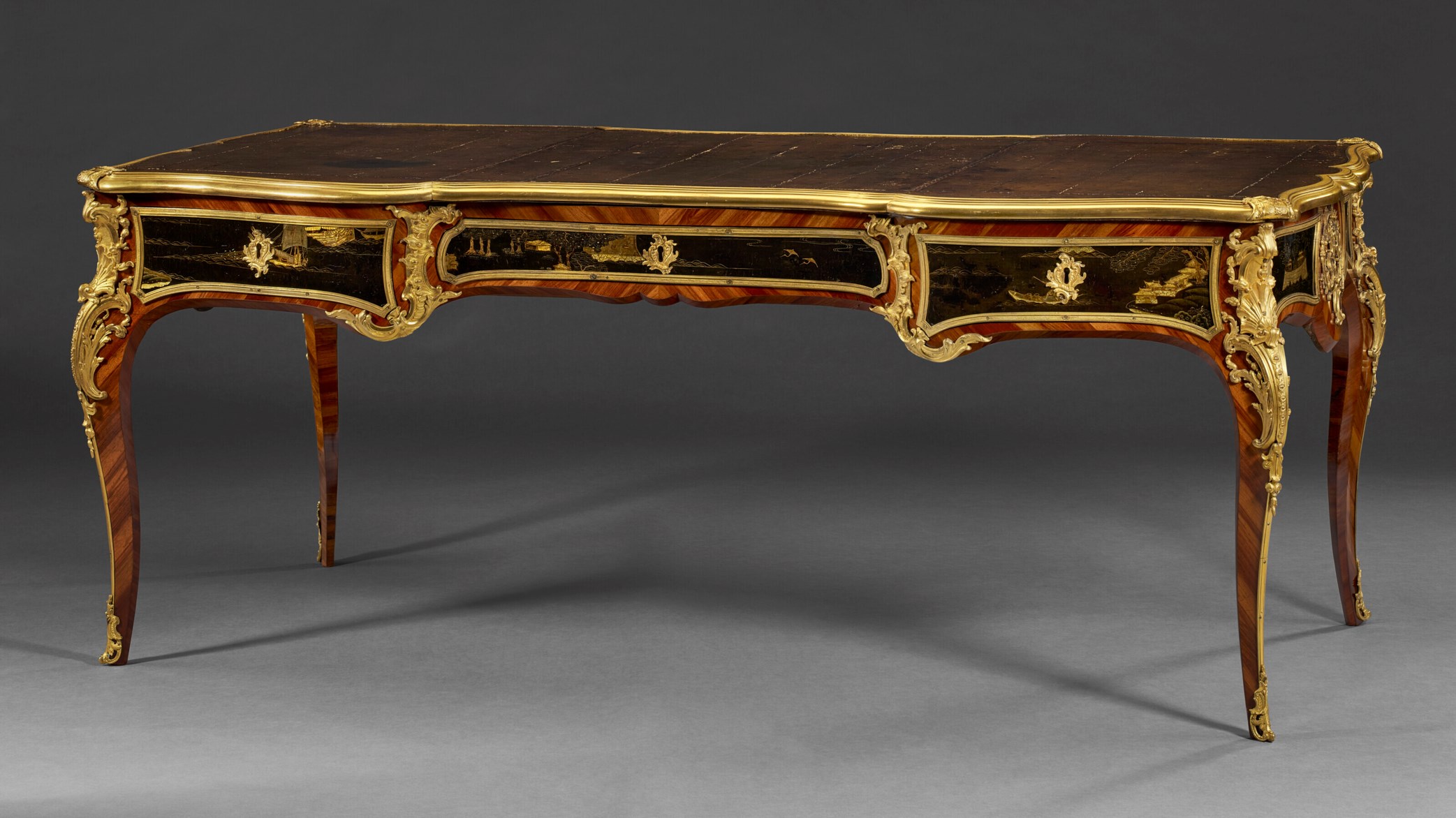 A LOUIS XV ORMOLU-MOUNTED BOIS SATINE AND CHINESE LACQUER BUREAU PLAT ...
