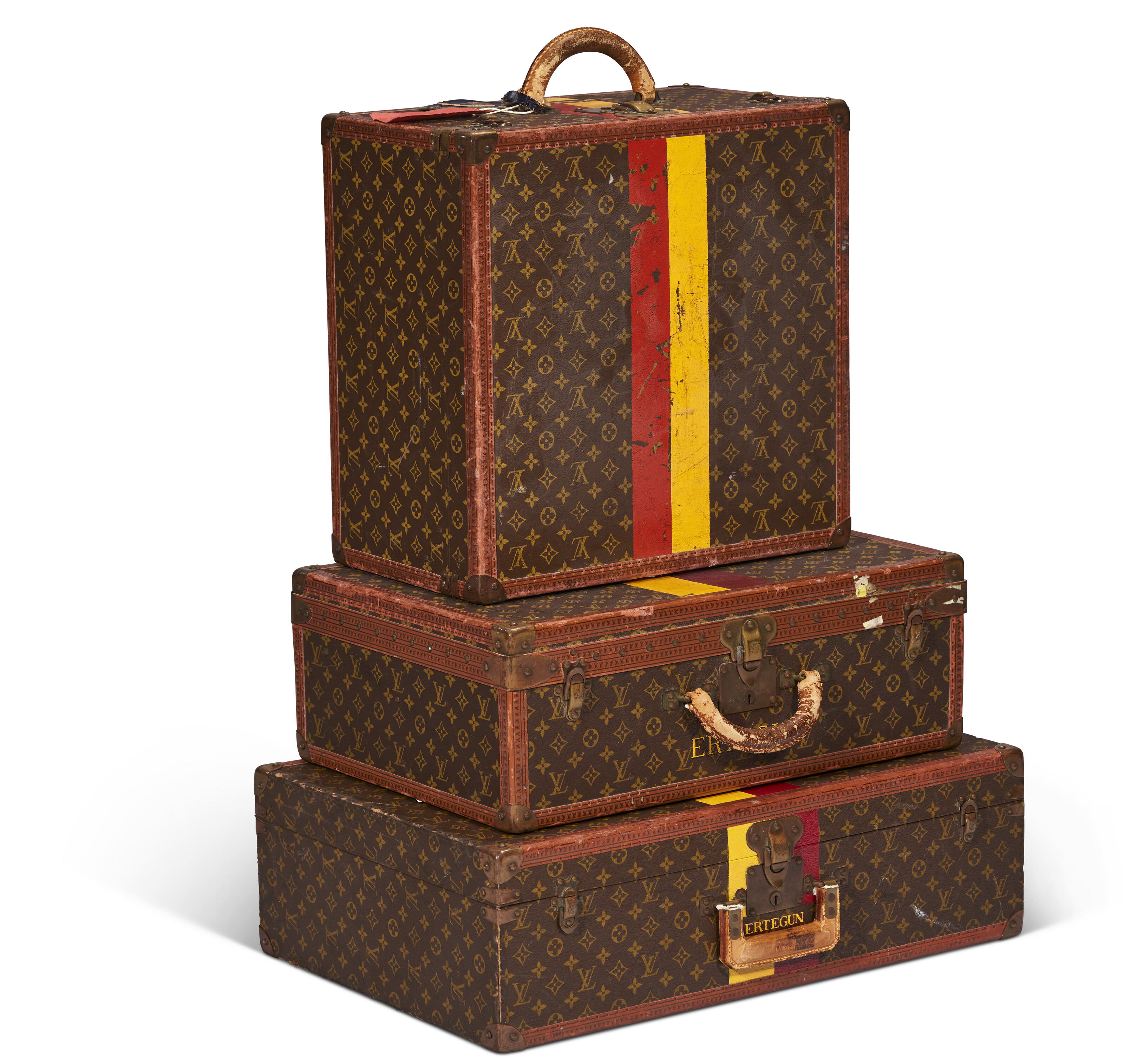 A SET OF THREE: PERSONALIZED MONOGRAM CANVAS HARDSIDED SUITCASES
