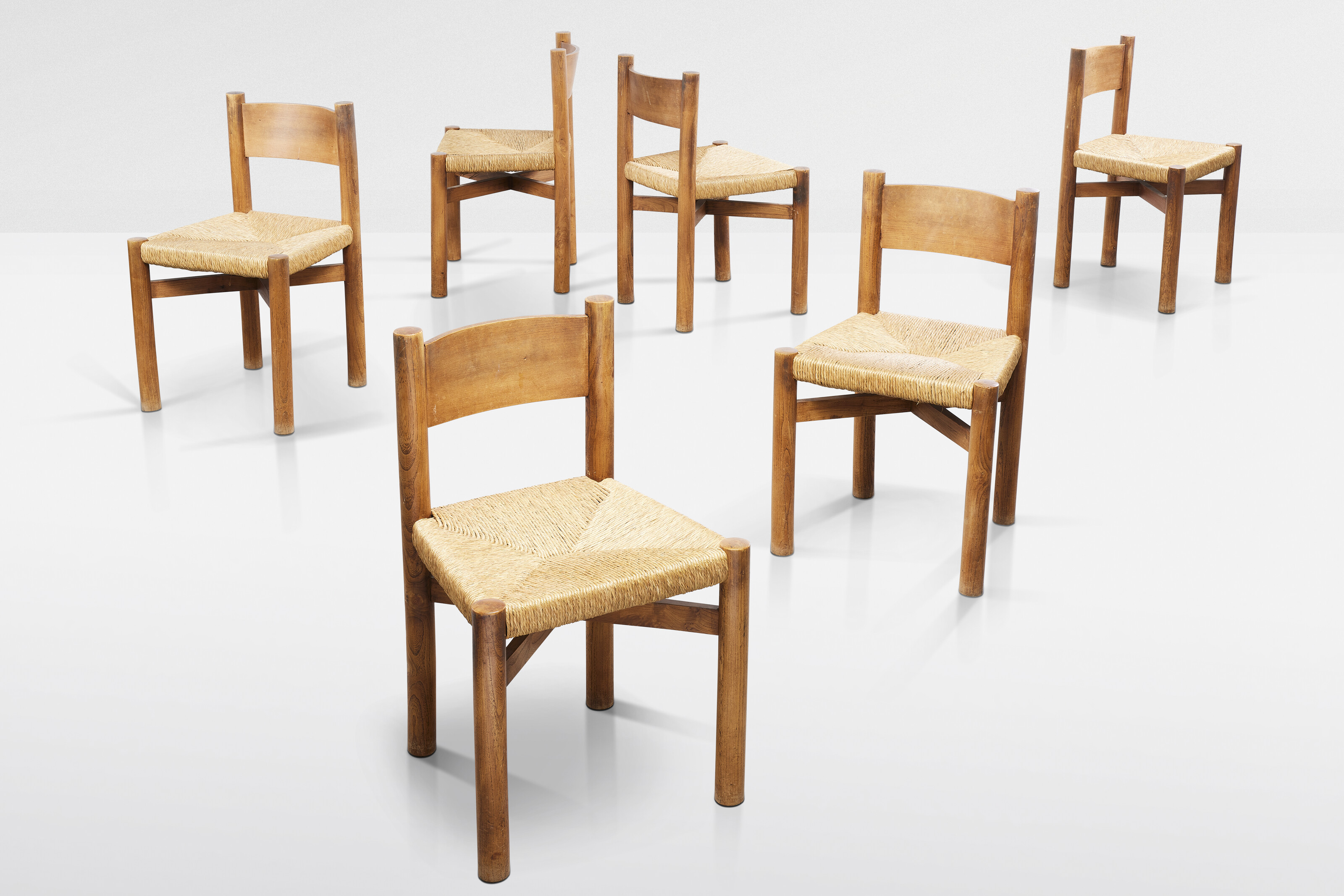 Charlotte Perriand, Suite of six Courchevel chairs, a variant of the model created for Etienne Sicard's apartment in Tokyo in 1941, Steph Simon edition, circa 1960, offered in Design on 23 May 2024 at Christie's in Paris