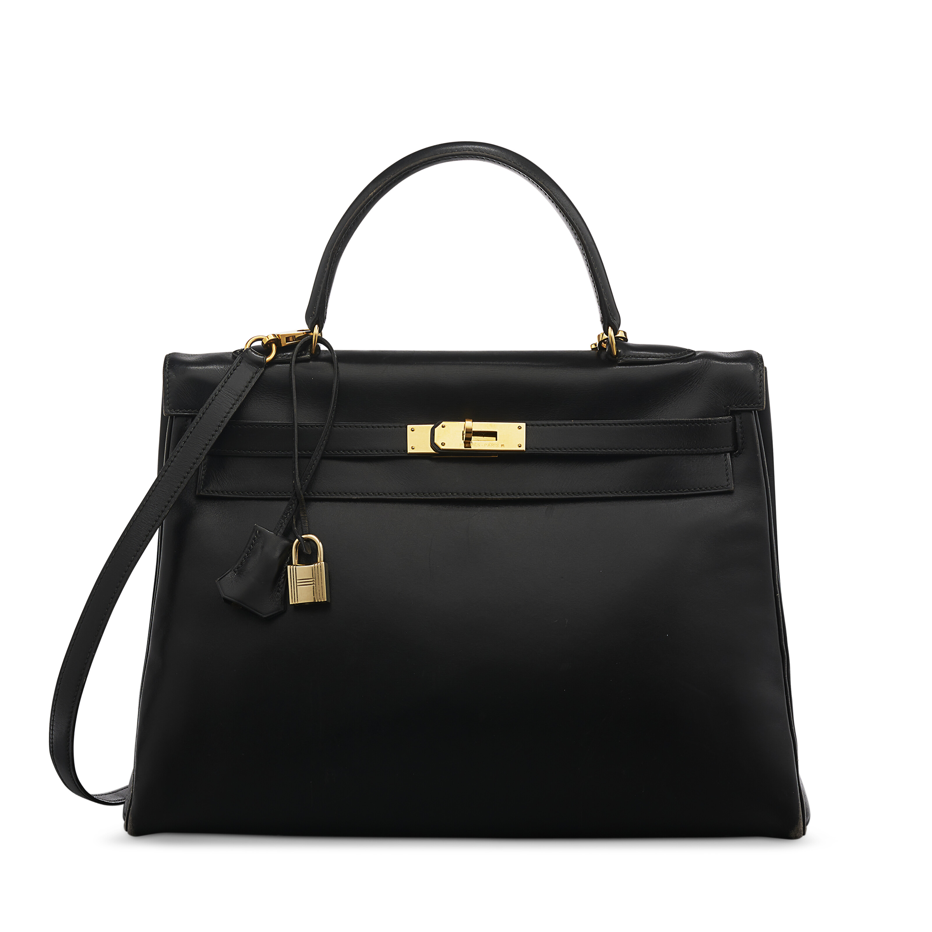 A BLACK CALF BOX LEATHER RETOURNÉ KELLY 35 WITH GOLD HARDWARE