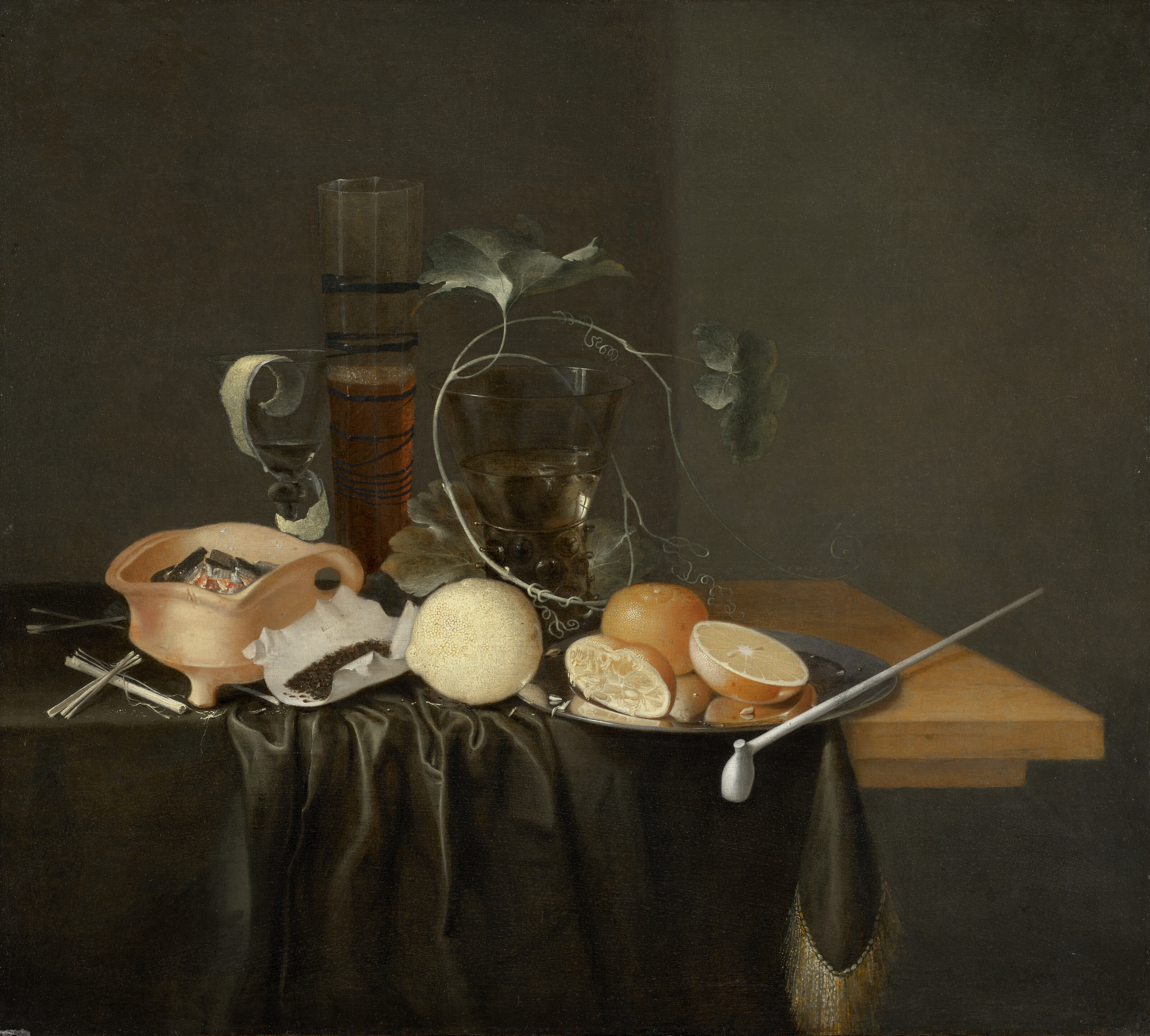 Laurens Craen, Still life with a passglass and a roemer surrounded by vine tendrils set on a draped ledge next to a brazier, tobacco, a lemon and a pewter plate on which oranges and a pipe are arranged, offered in Collections: Including the Property of International Interior Designer Robert Couturier, 16-29 October 2024 at Christie's Online