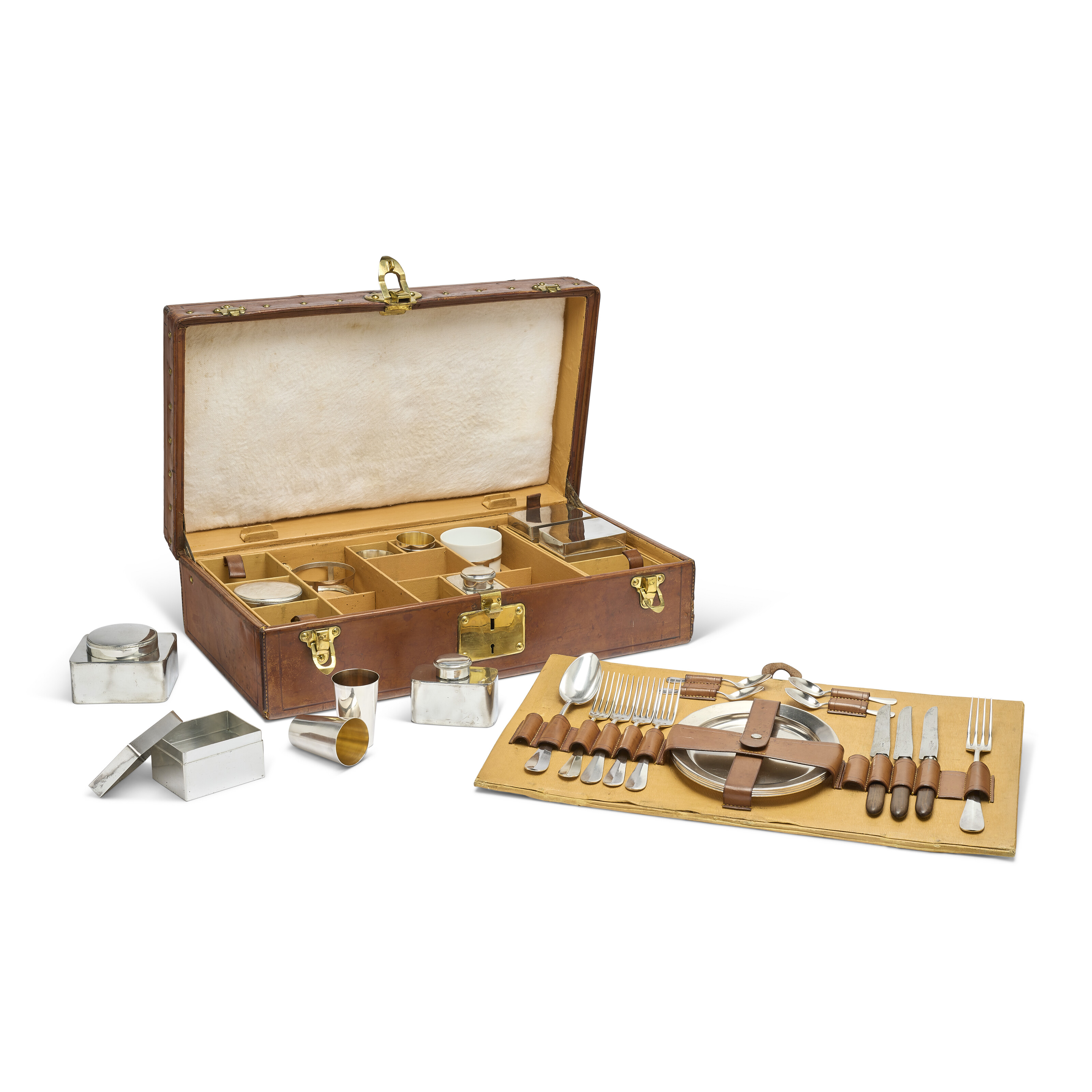 A NATURAL COWHIDE LEATHER PICNIC TRUNK WITH BRASS HARDWARE, LOUIS