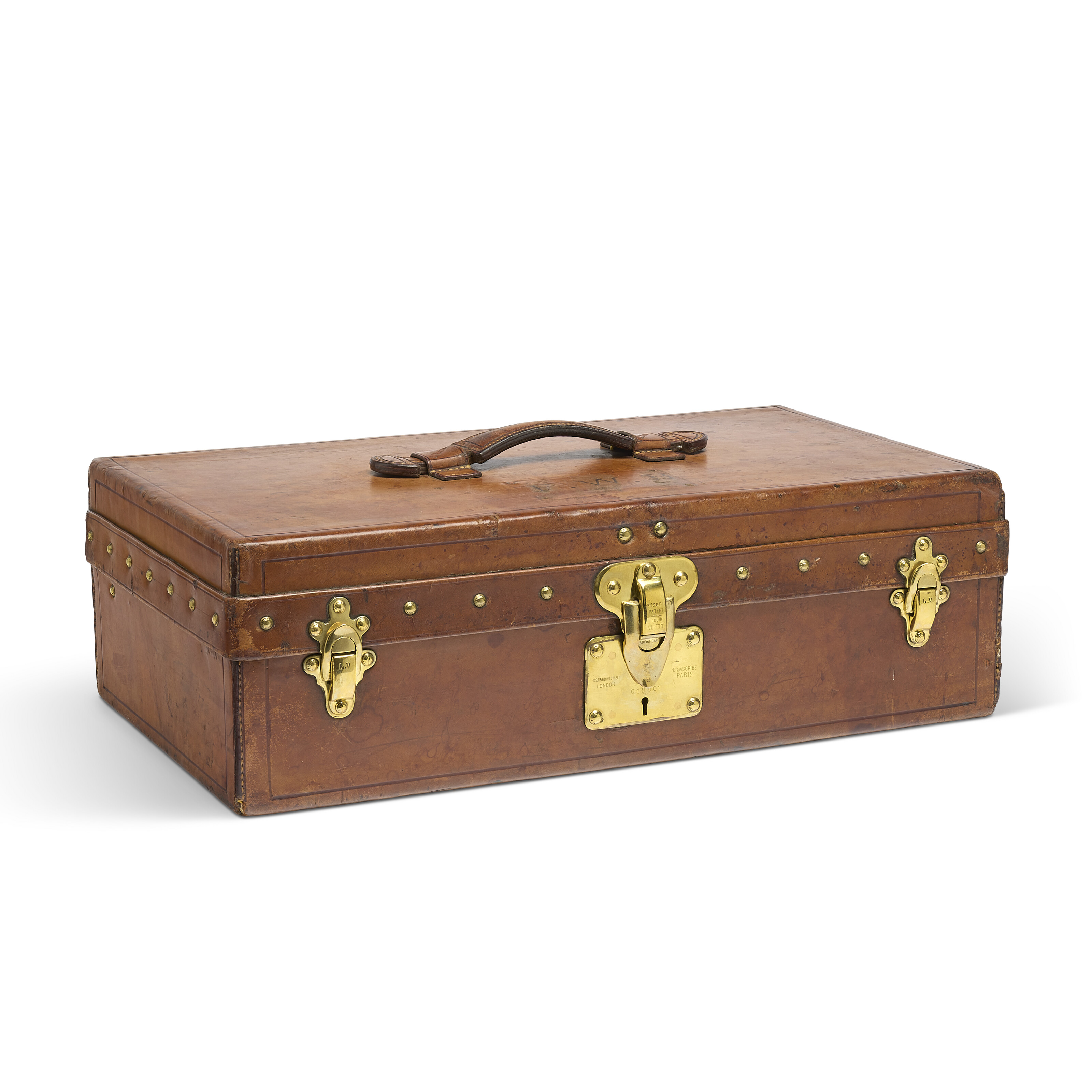 A NATURAL COWHIDE LEATHER PICNIC TRUNK WITH BRASS HARDWARE, LOUIS