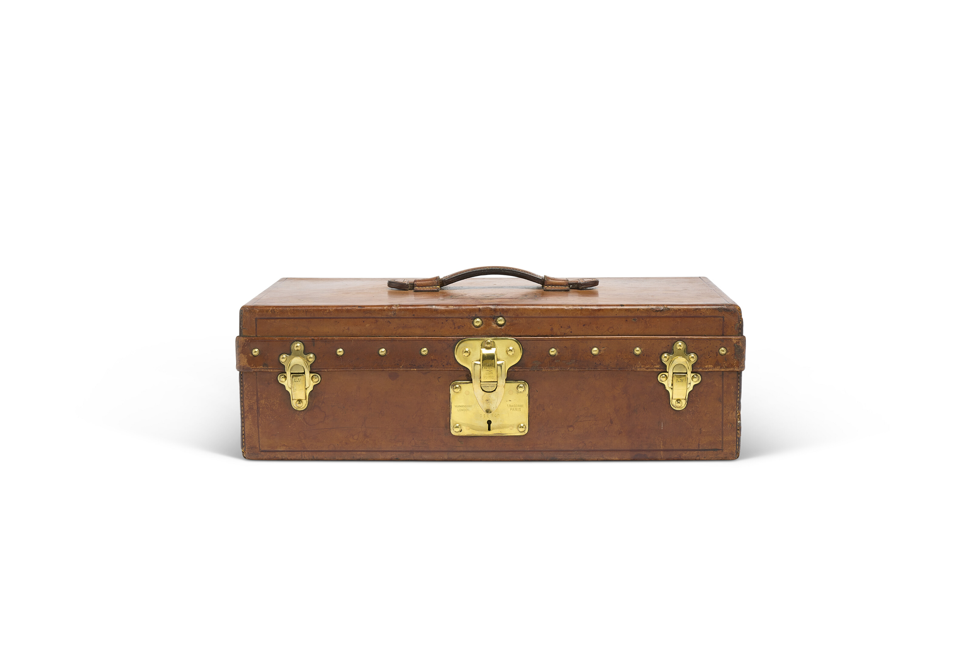 A NATURAL COWHIDE LEATHER PICNIC TRUNK WITH BRASS HARDWARE, LOUIS