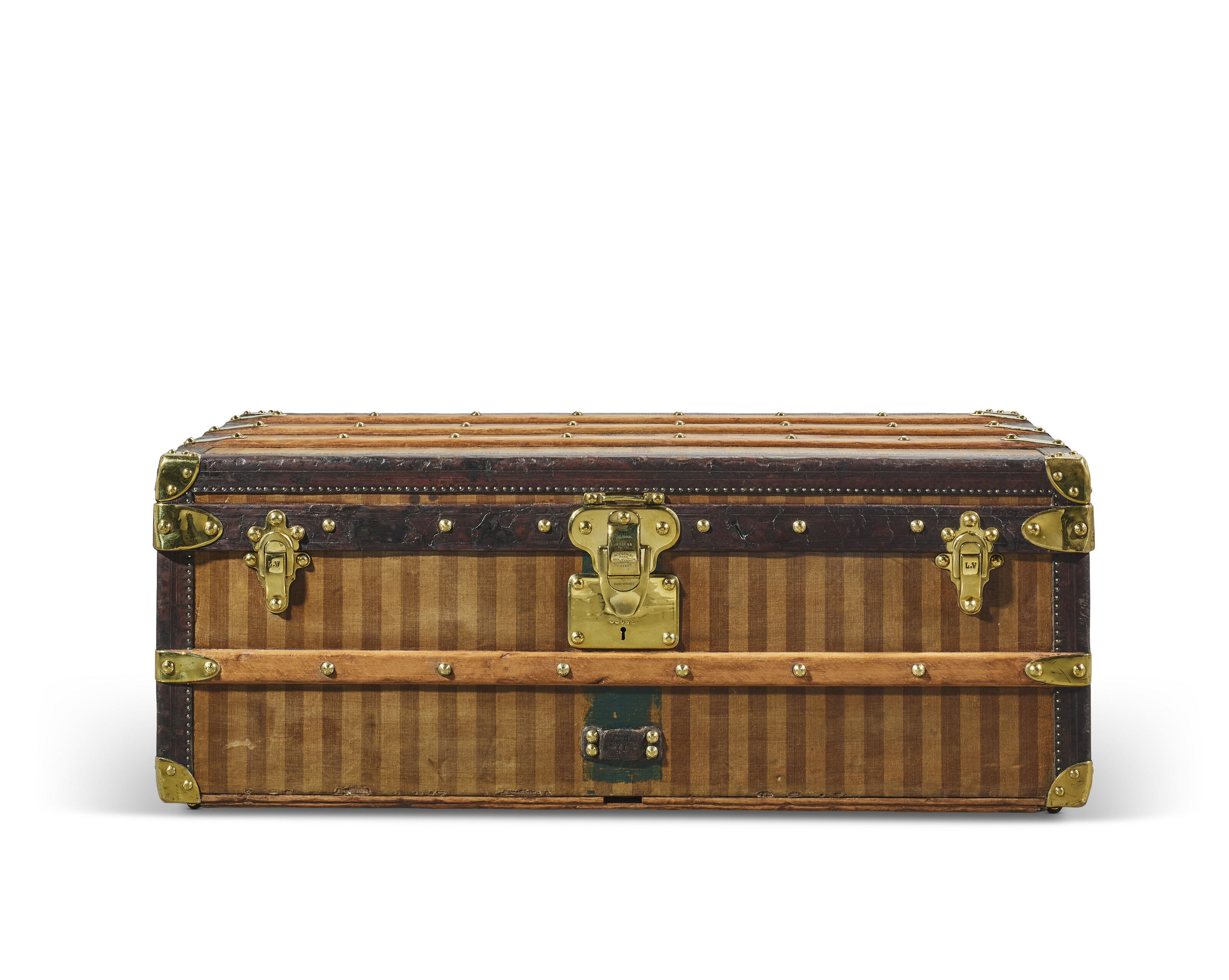 A beige and brown striped canvas Cabin 90 trunk with brass hardware, Louis Vuitton, 1895, offered in Legendary trunks: A European Private Collection until 3 July 2024 at Christie's Online