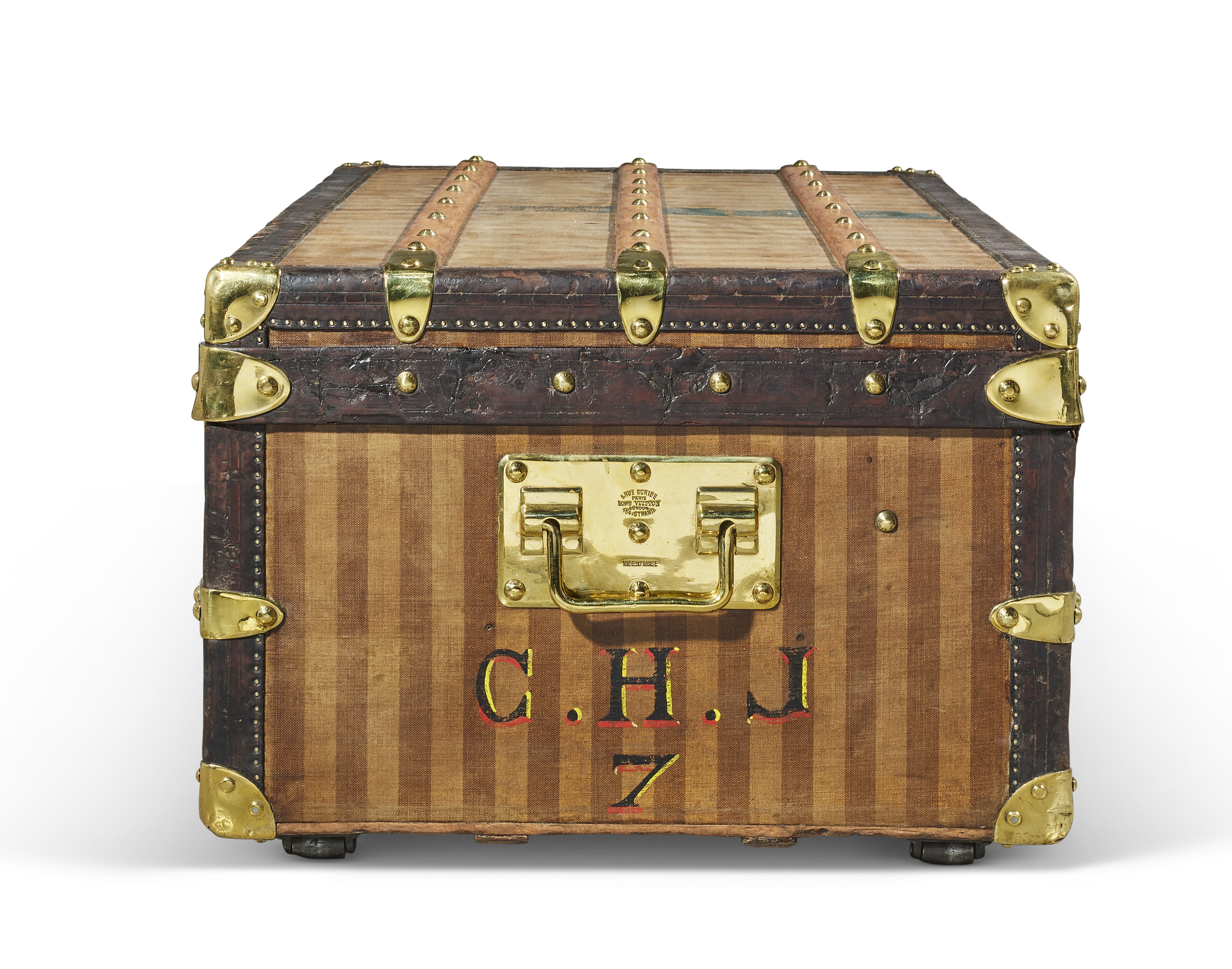 A BEIGE & BROWN STRIPED CANVAS CABIN 90 TRUNK WITH BRASS HARDWARE