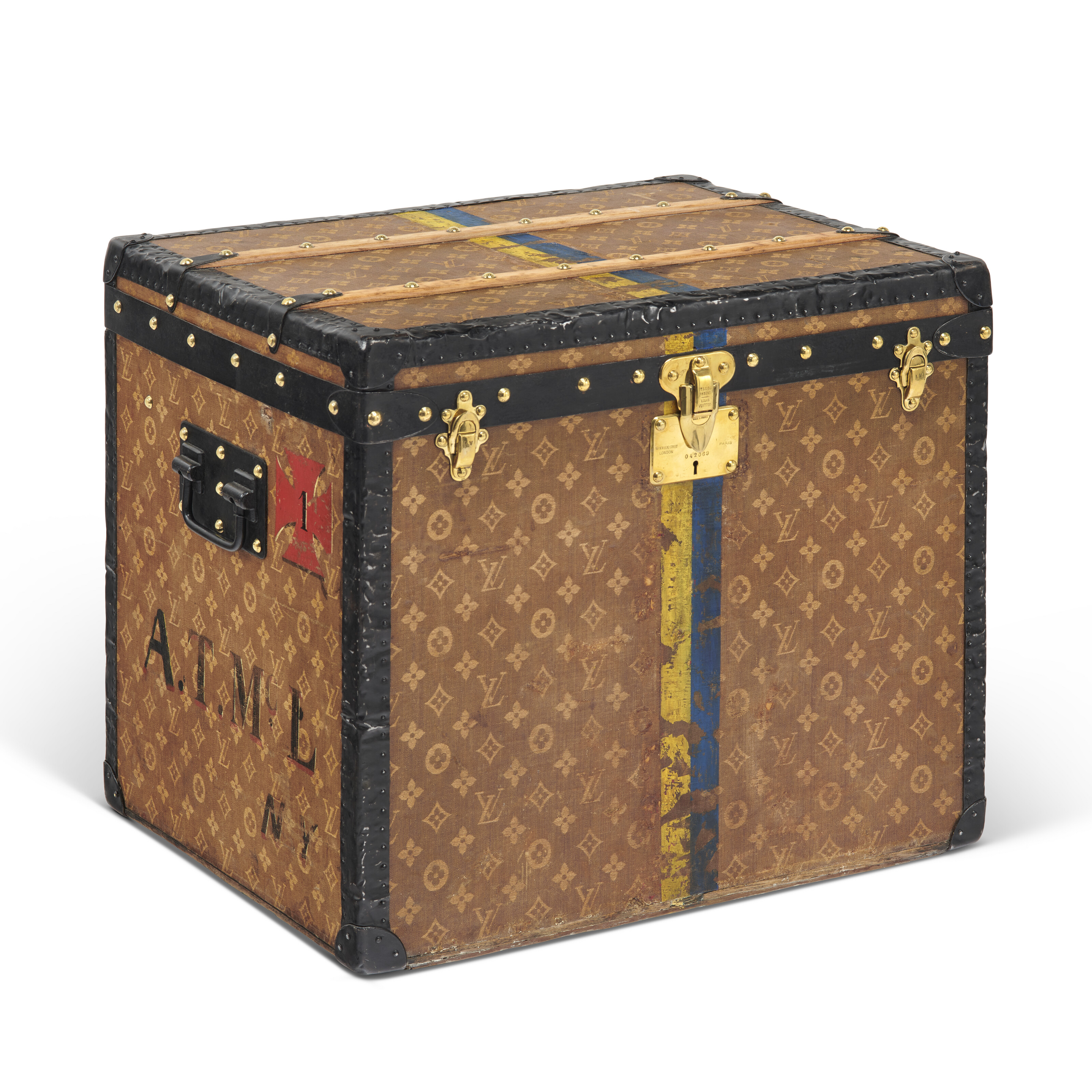 AN ORANGE VUITTONITE CANVAS COURRIER 100 TRUNK WITH BRASS HARDWARE