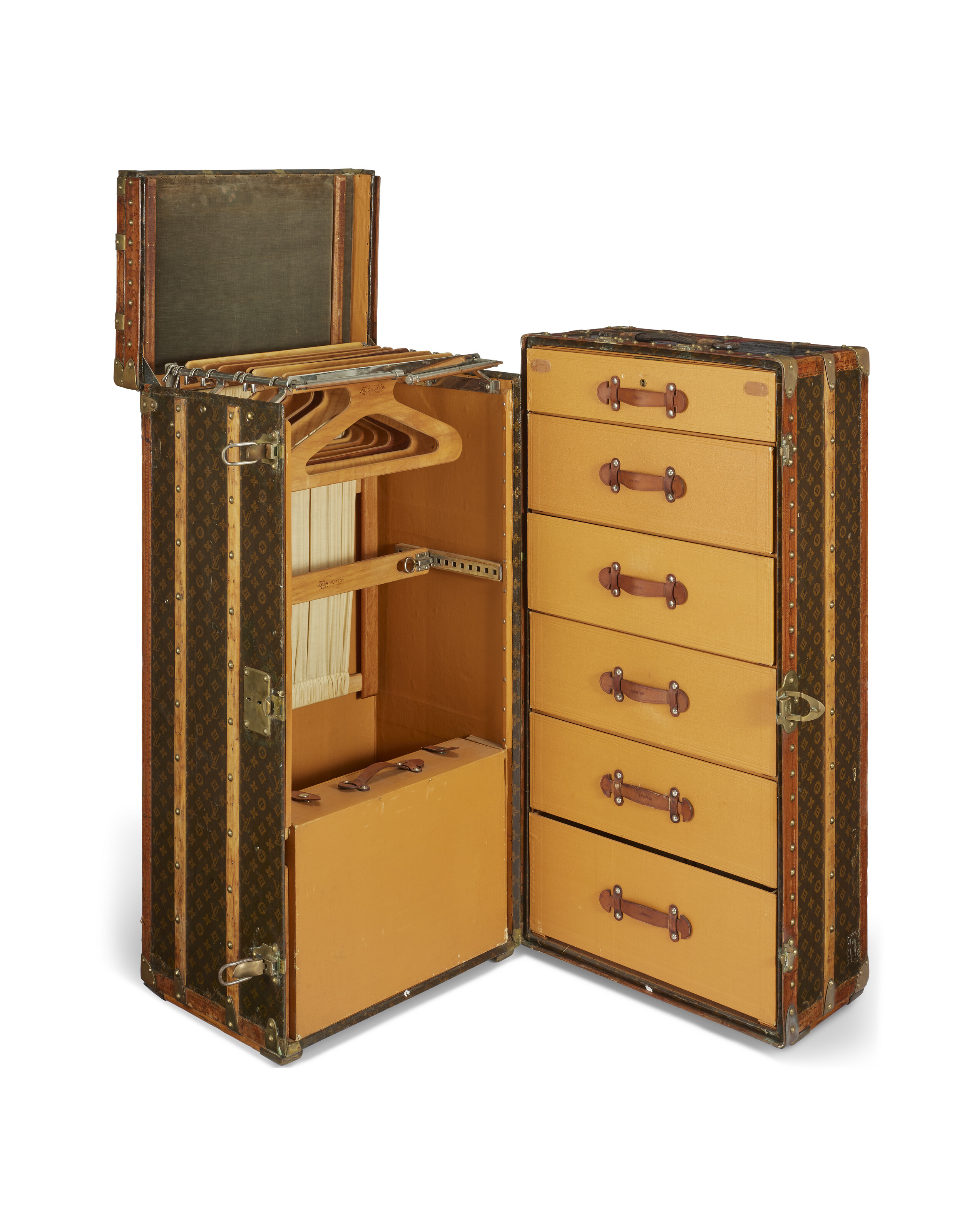 A monogram canvas wardrobe trunk with brass hardware, Louis Vuitton, 1930, offered in Legendary trunks: A European Private Collection until 3 July 2024 at Christie's Online