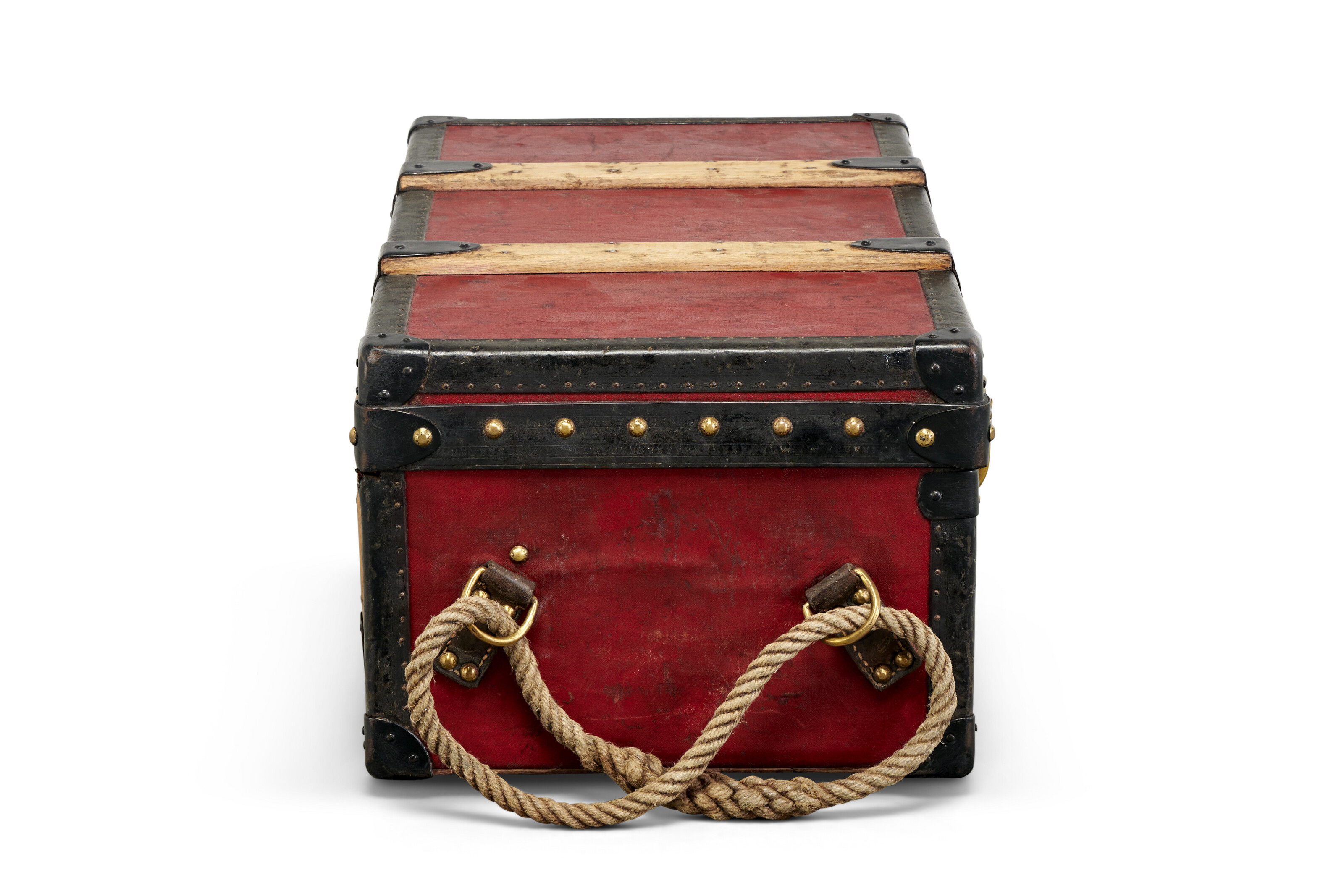 A RED VUITTONITE CANVAS TRUNK WITH BRASS HARDWARE, LOUIS VUITTON