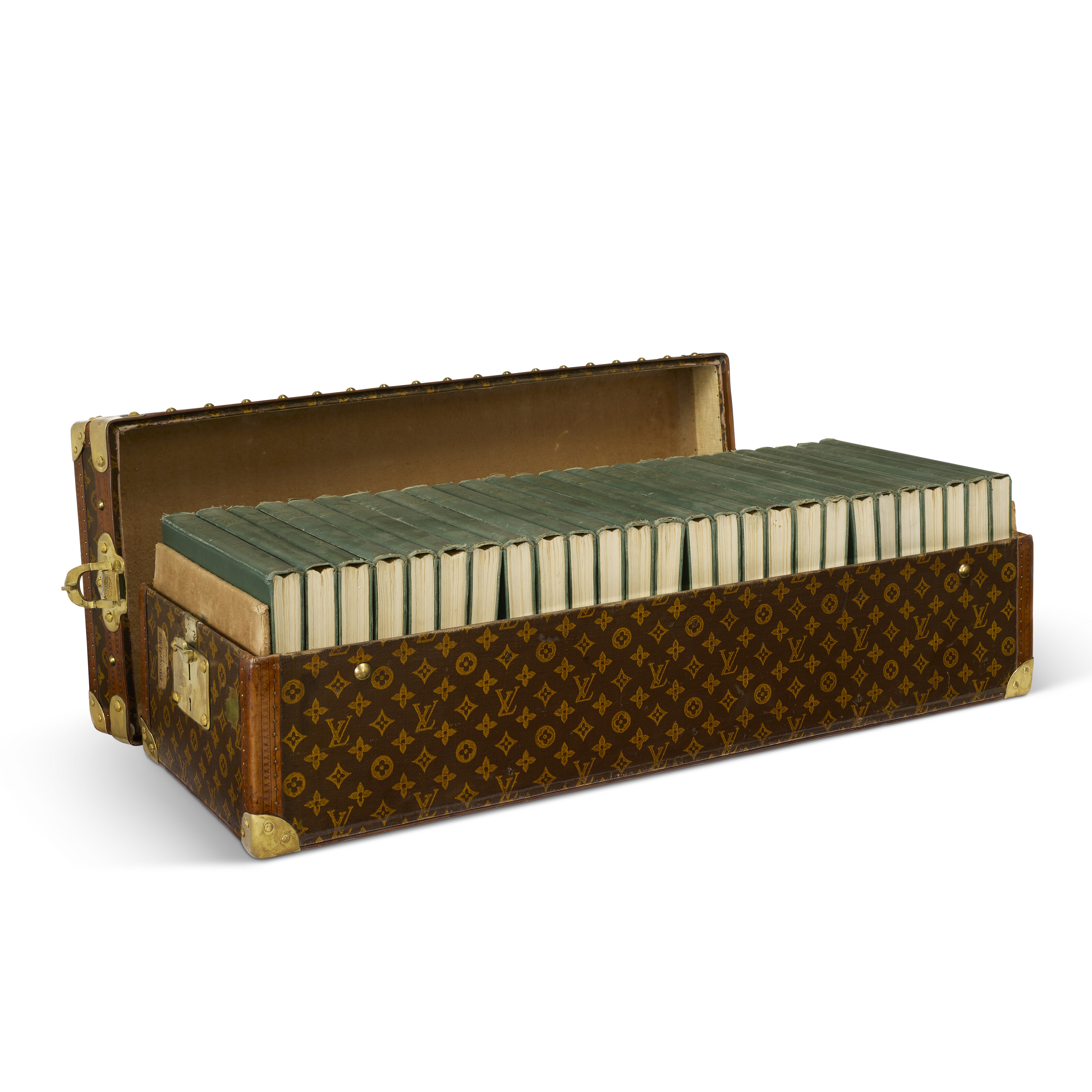 A SPECIAL ORDER MONOGRAM CANVAS CROQUET TRUNK WITH BRASS