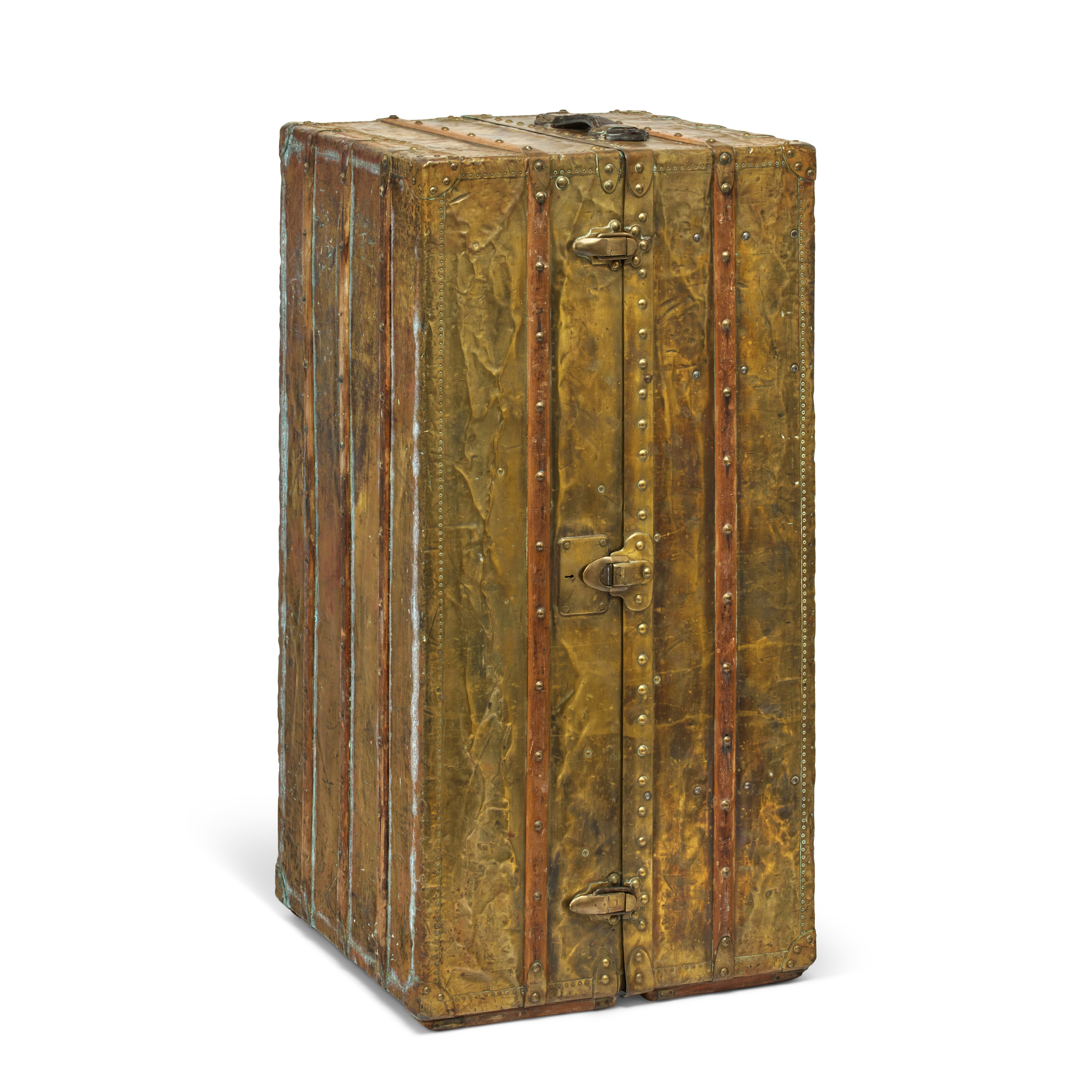 A rare hermetic copper Explorer wardrobe trunk with brass hardware, Louis Vuitton, 1925, offered in Legendary trunks: A European Private Collection until 3 July 2024 at Christie's Online