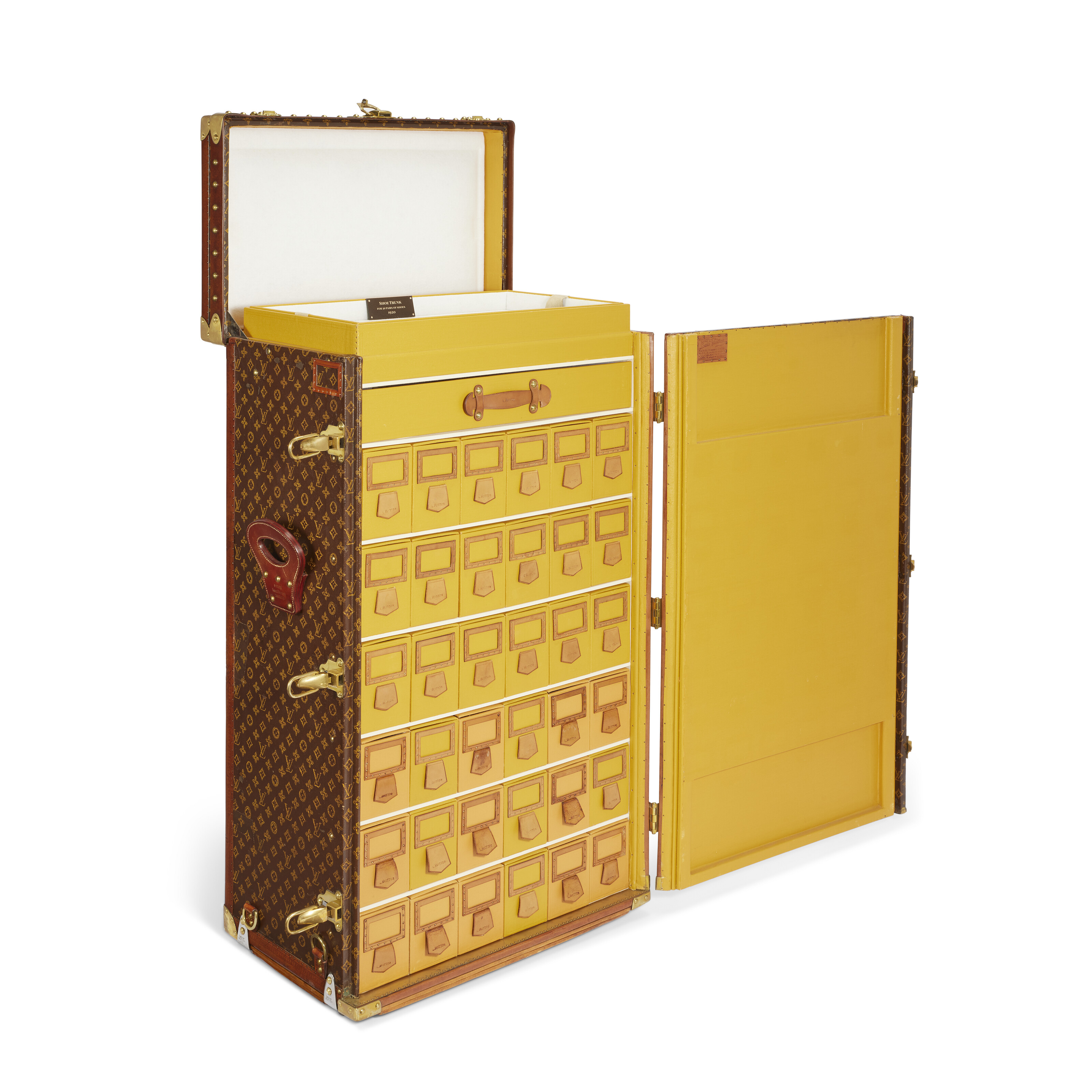 A monogram canvas desk trunk for 36 pairs of shoes, with brass hardware, Louis Vuitton, 1926, offered in Legendary trunks: A European Private Collection until 3 July 2024 at Christie's Online
