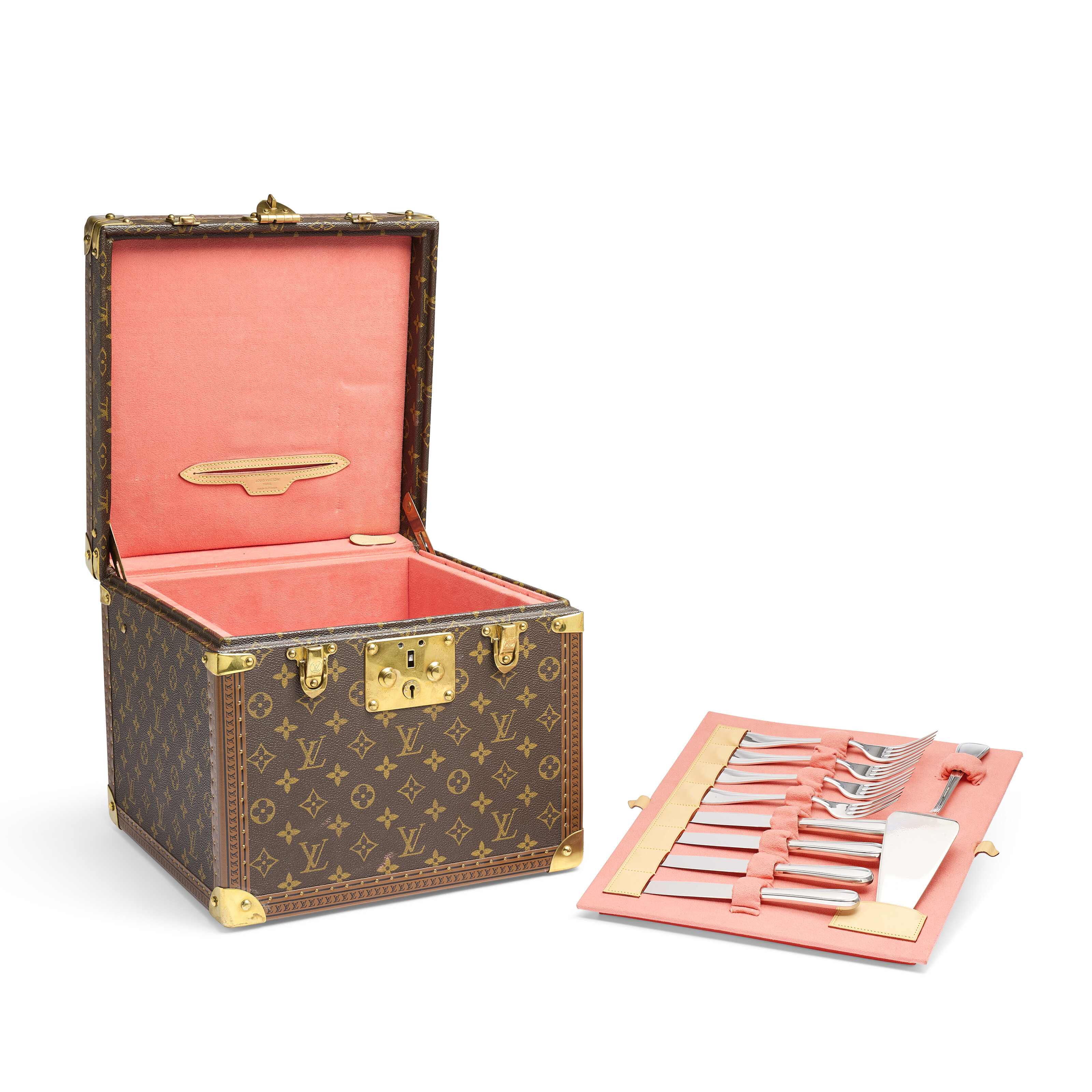 A special-order monogram canvas box for a birthday cake, with brass hardware, by Tomoko Tashiro, Louis Vuitton, 2004, offered in Legendary trunks: A European Private Collection until 3 July 2024 at Christie's Online