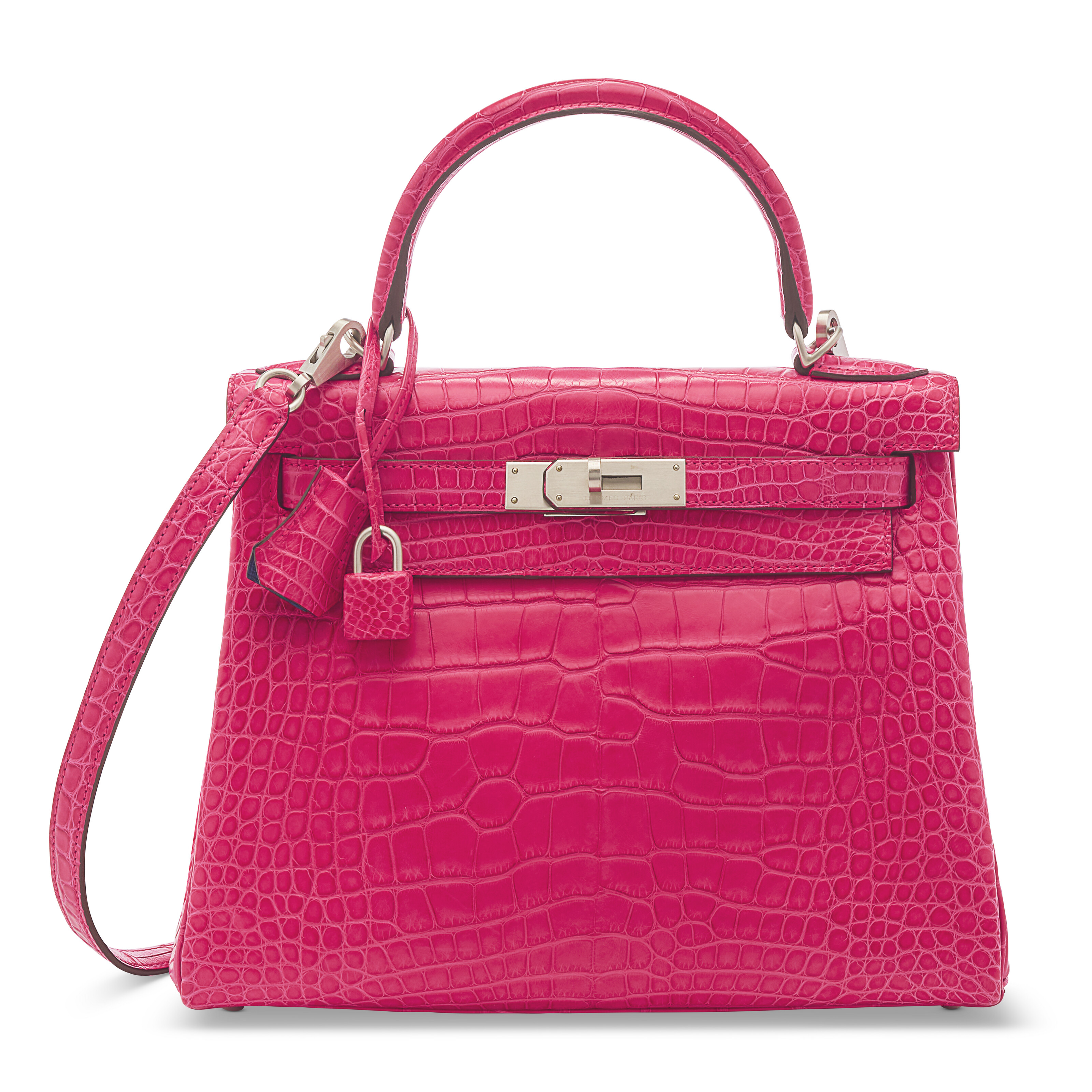A special order matte rose extreme and iris alligator retourne Kelly 28 with brushed palladium hardware, Hermes, 2020, offered in Unlocking the Orange Dream: Handbags from an Important Private Collection from 30 October to 13 November 2024 at Christie's Online