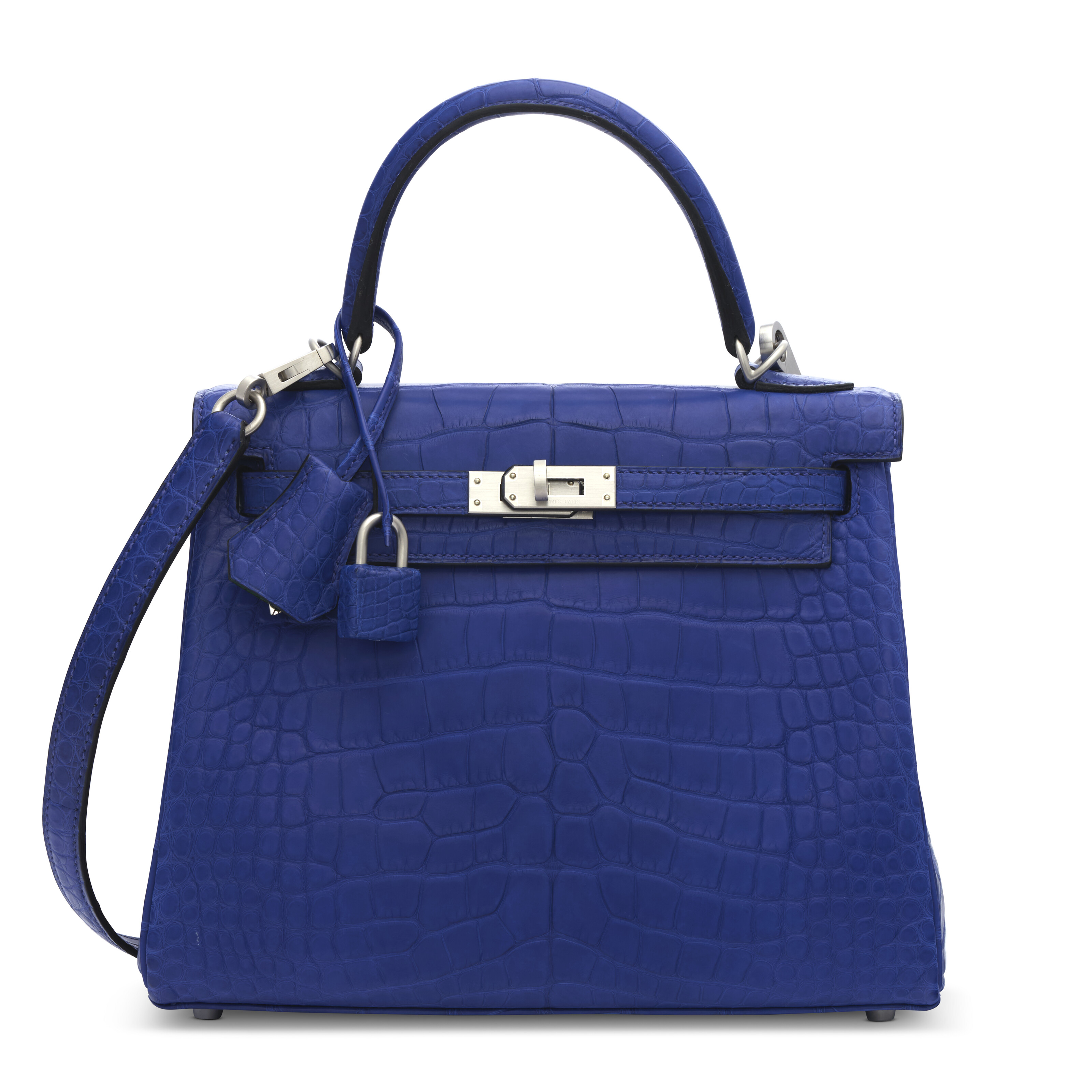 A special order matte bleu electrique and vert pelouse alligator retourne Kelly 25 with brushed palladium hardware, Hermes, 2021, offered in Unlocking the Orange Dream: Handbags from an Important Private Collection from 30 October to 13 November 2024 at Christie's Online