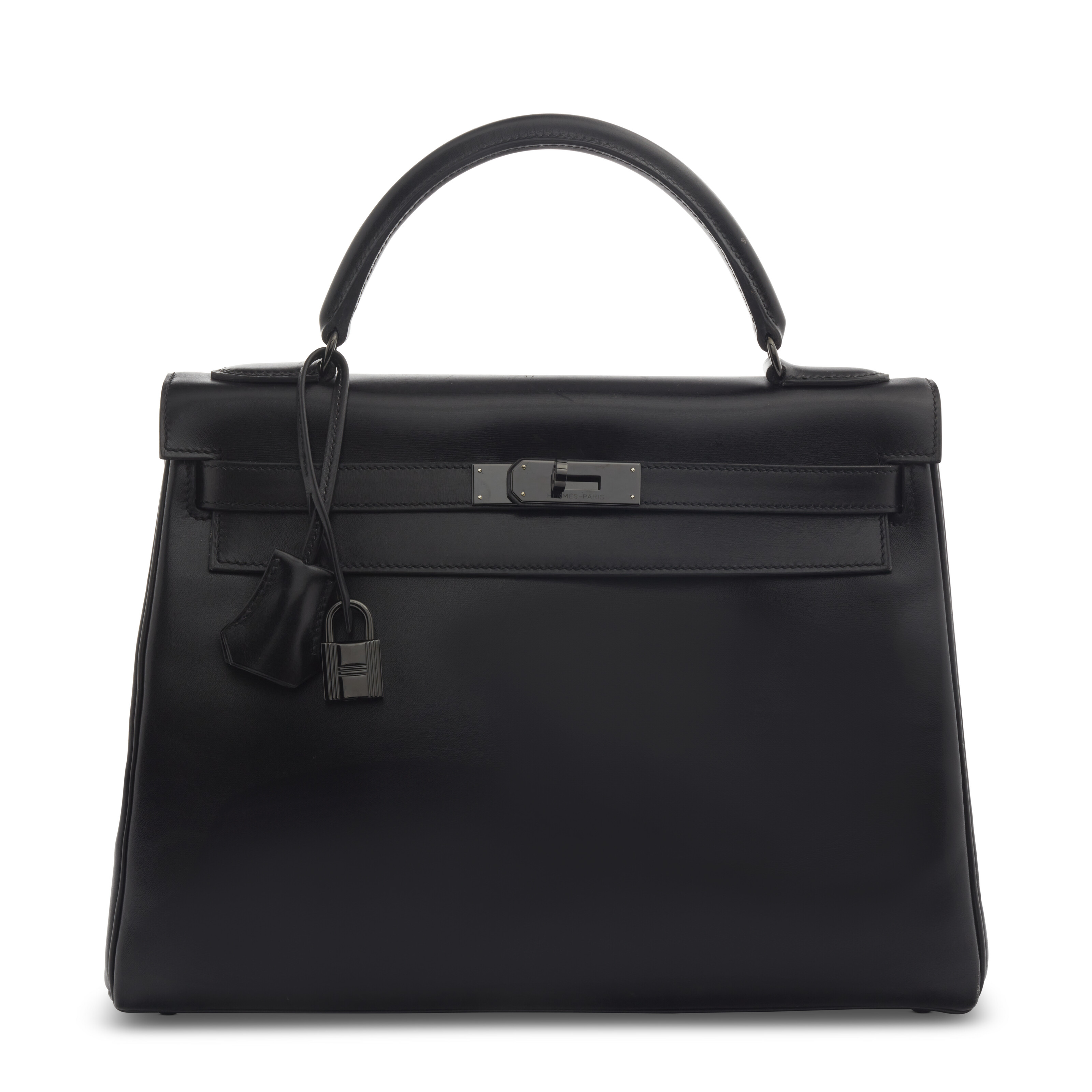 A limited-edition black calf box leather So Black Retourne Kelly 32 with black PVD hardware, Hermes, 2010, offered in Unlocking the Orange Dream: Handbags from an Important Private Collection from 30 October to 13 November 2024 at Christie's Online