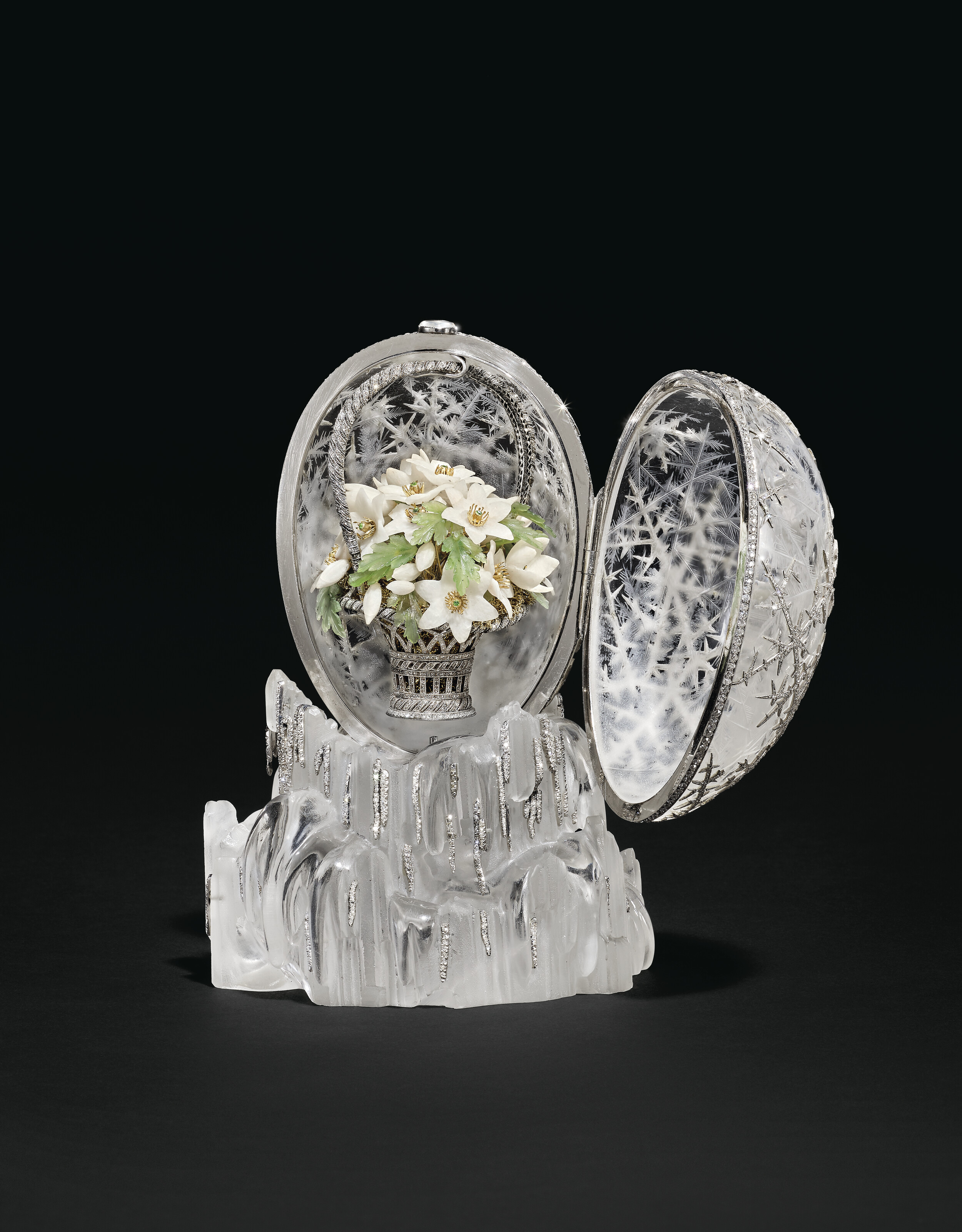 A MAGNIFICENT AND HIGHLY IMPORTANT IMPERIAL WINTER EGG, BY FABERGÉ