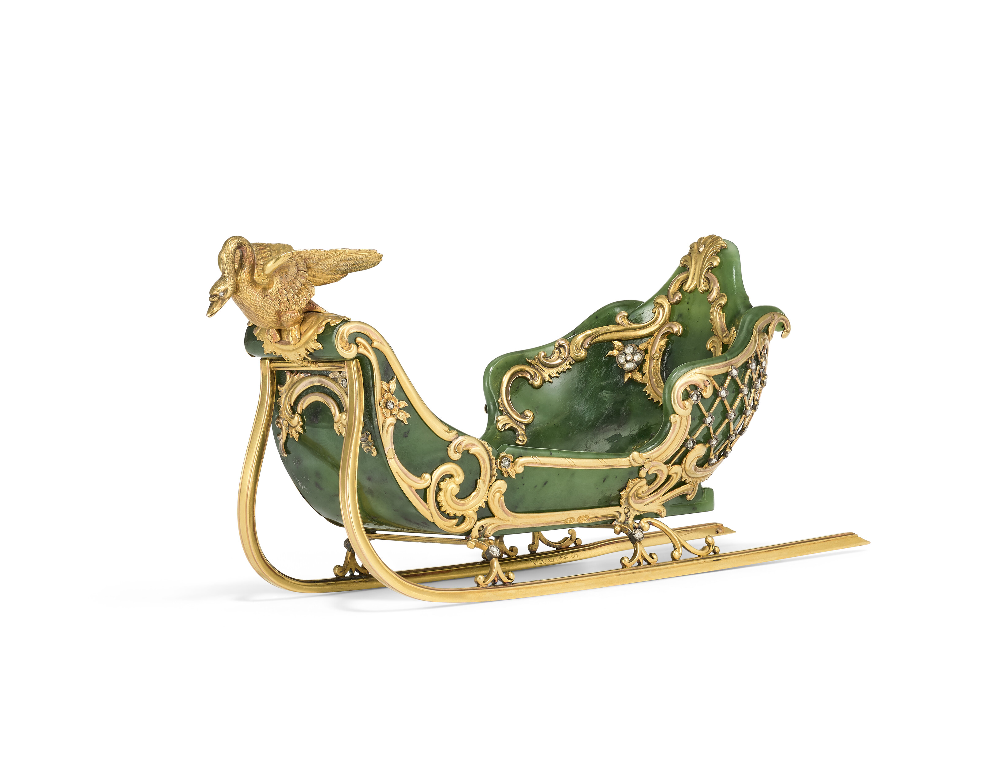 A rare jewelled gold-mounted nephrite miniature model of a sleigh. By Faberge, workmaster Michael Perchin, St Petersburg, circa 1890, offered in The Winter Egg and Important Works by Faberge from a Princely Collection on 2 December 2025 at Christie's in London