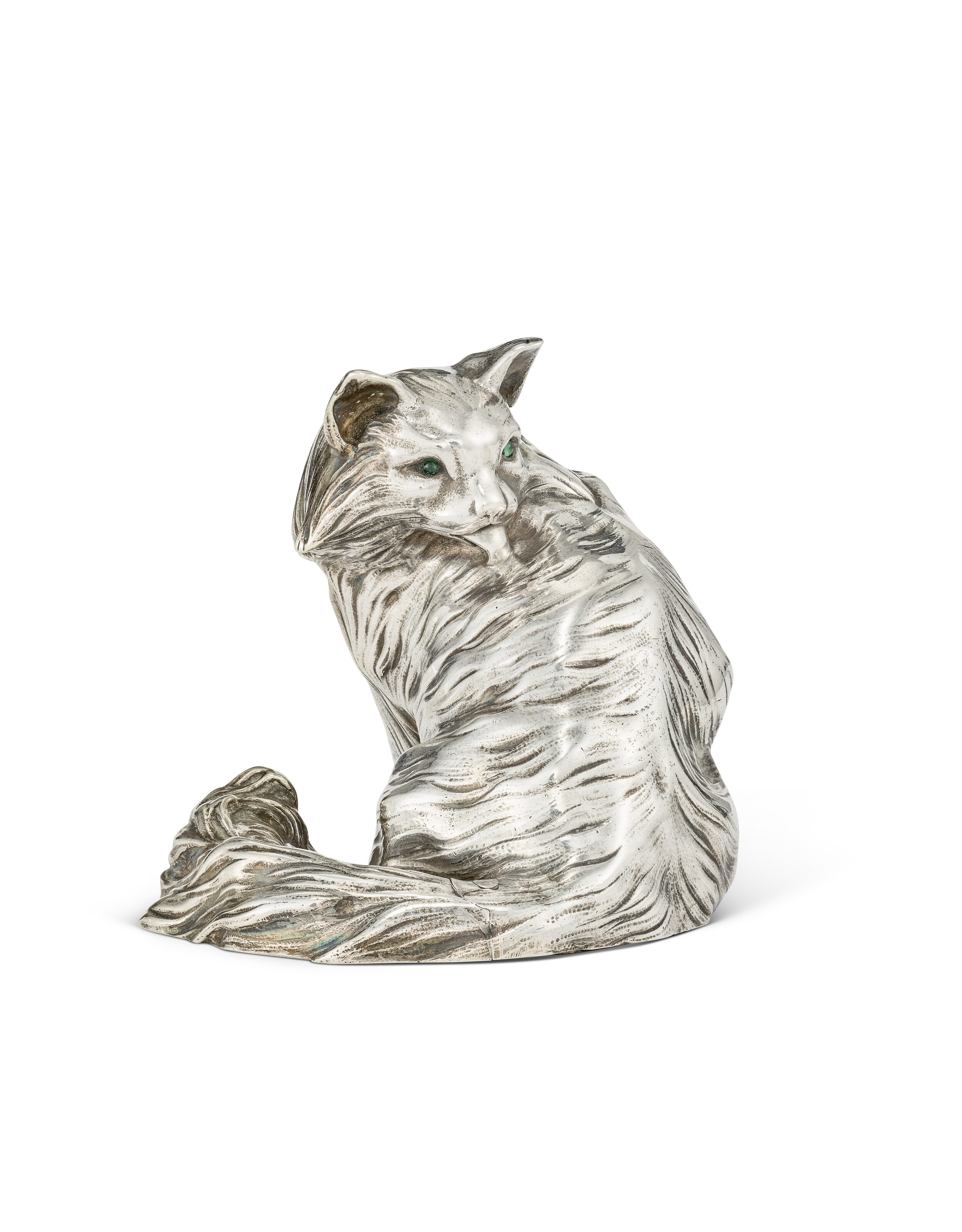 A gem-set silver bell-push in the form of a cat. By Faberge, workmaster Karl (Hjalmar) Armfelt, St Petersburg, 1908-17, offered in The Winter Egg and Important Works by Faberge from a Princely Collection on 2 December 2025 at Christie's in London