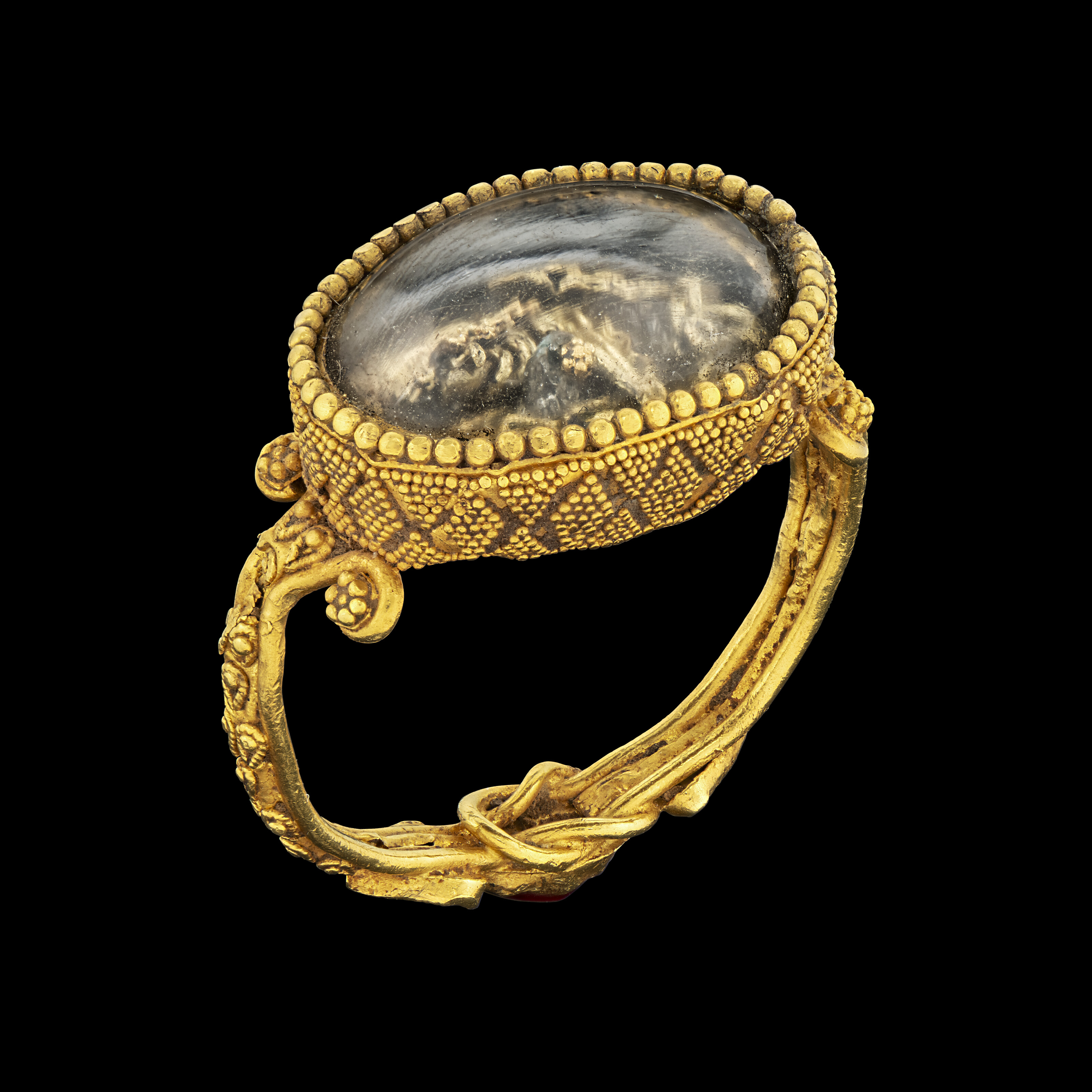 A Greek gold, rock crystal and garnet box bezel ring, Hellenistic period, circa 3rd to 2nd century B.C., offered in Antiquities on 2 July 2025 at Christie's in London